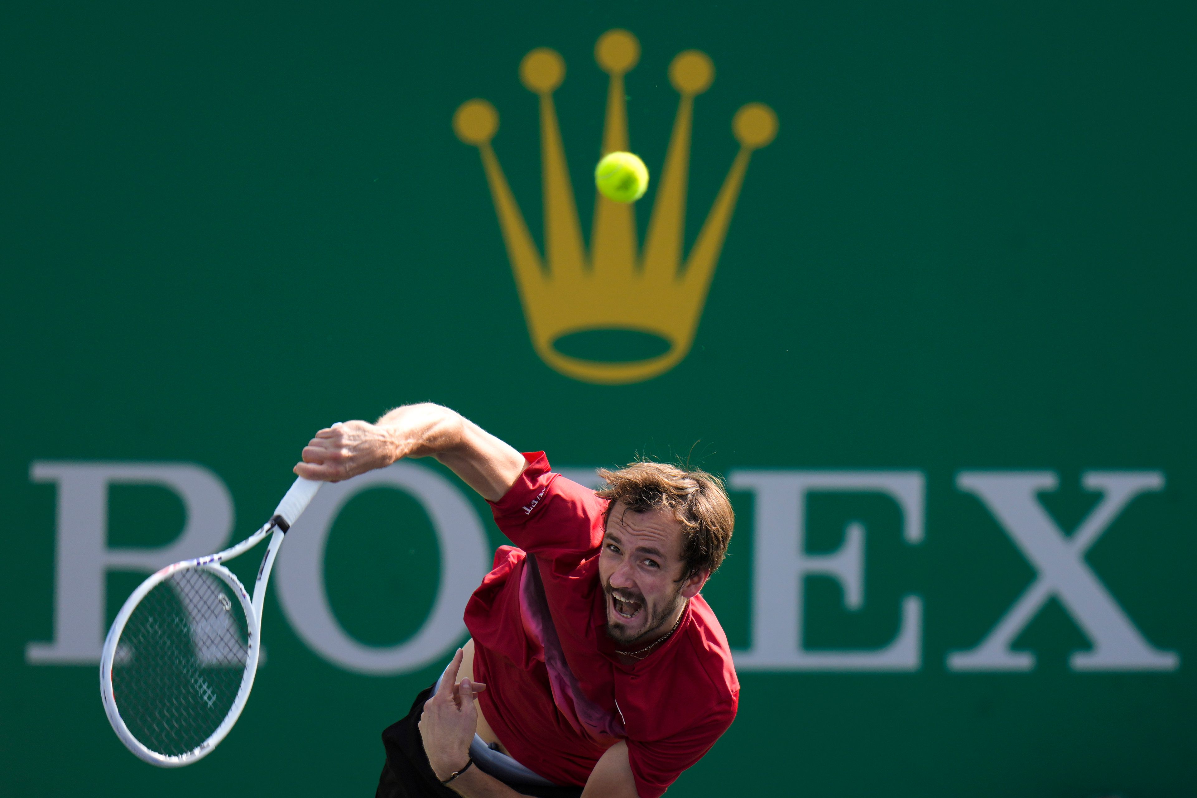 Daniil Medvedev of Russia serves against Stefanos Tsitsipas of Greece during the men's singles fourth round match in the Shanghai Masters tennis tournament at Qizhong Forest Sports City Tennis Center in Shanghai, China, Wednesday, Oct. 9, 2024. (AP Photo/Andy Wong)