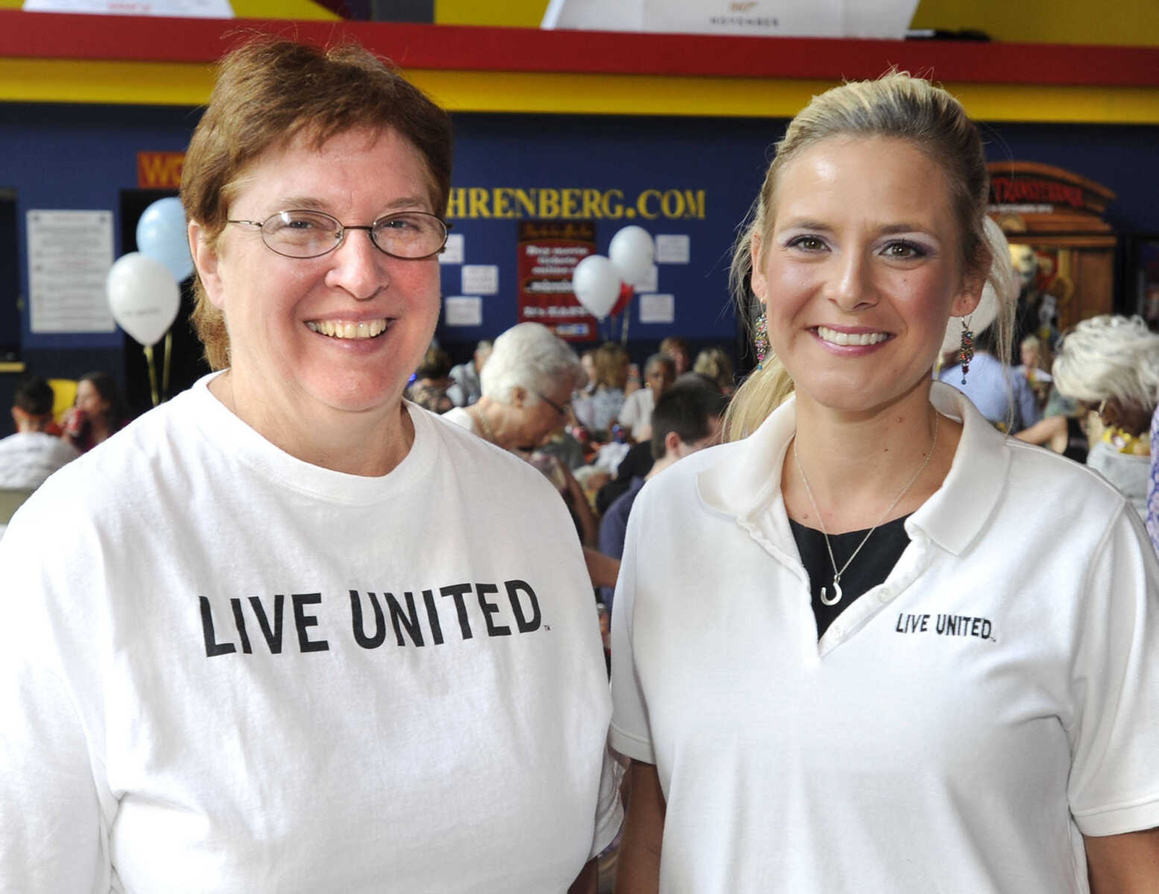 Kay Azuma, left, and Jeanne Churchill pose at the United Way of Southeast Missouri campaign kickoff Aug. 30 at West Park 14 Cine.