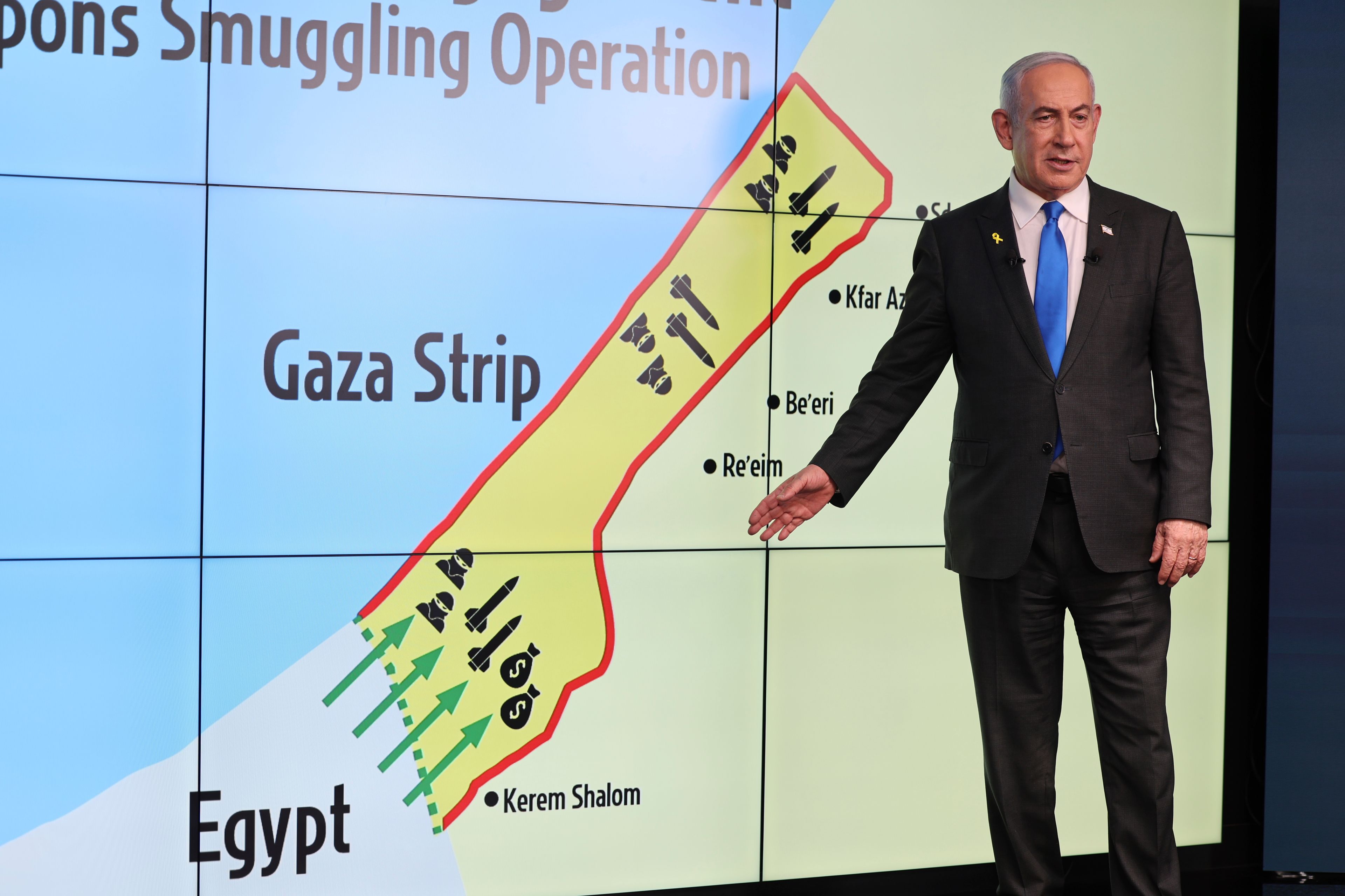 Israeli Prime Minister Benjamin Netanyahu gestures in front of a map during a press conference at the Government Press office in Jerusalem, Wednesday, Sept. 4, 2024. (Abir Sultan/Pool via AP)