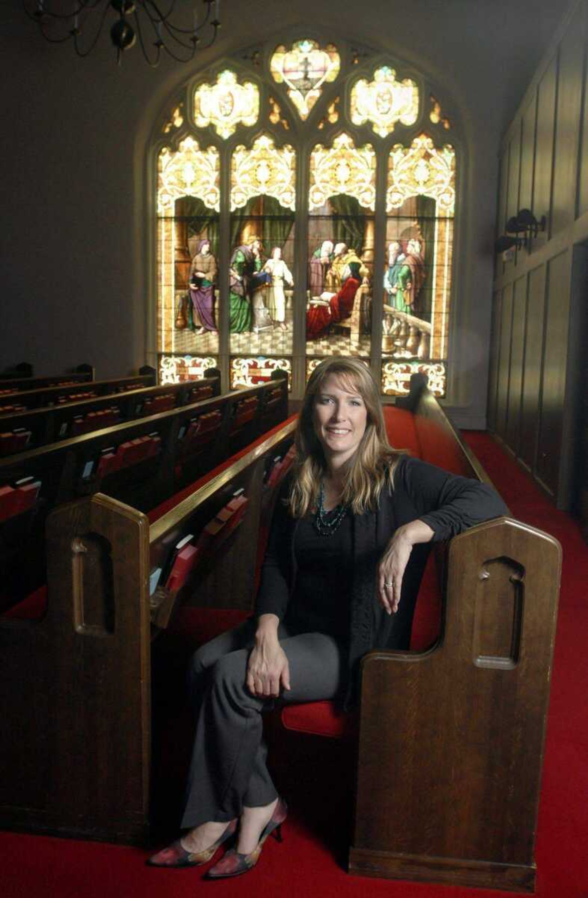 Melanie Smollen of Faith Perceptions sits inside Centenary United Methodist Church in Cape Girardeau.Laura Simonlsimon@semissourian.com