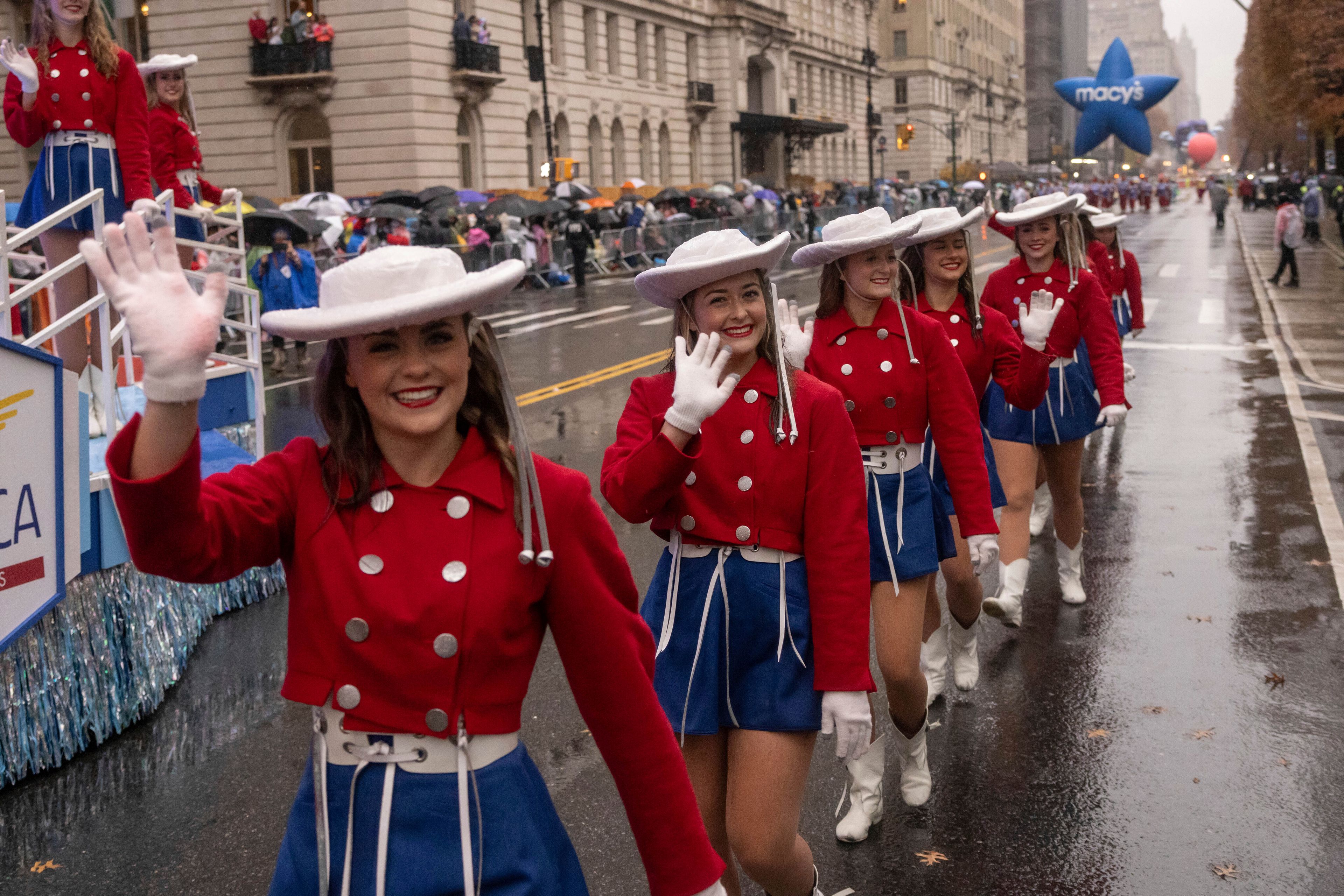 Parade performers march down Central Park West during the Macy's Thanksgiving Day parade, Thursday, Nov. 28 2024, in New York. (AP Photo/Yuki Iwamura)