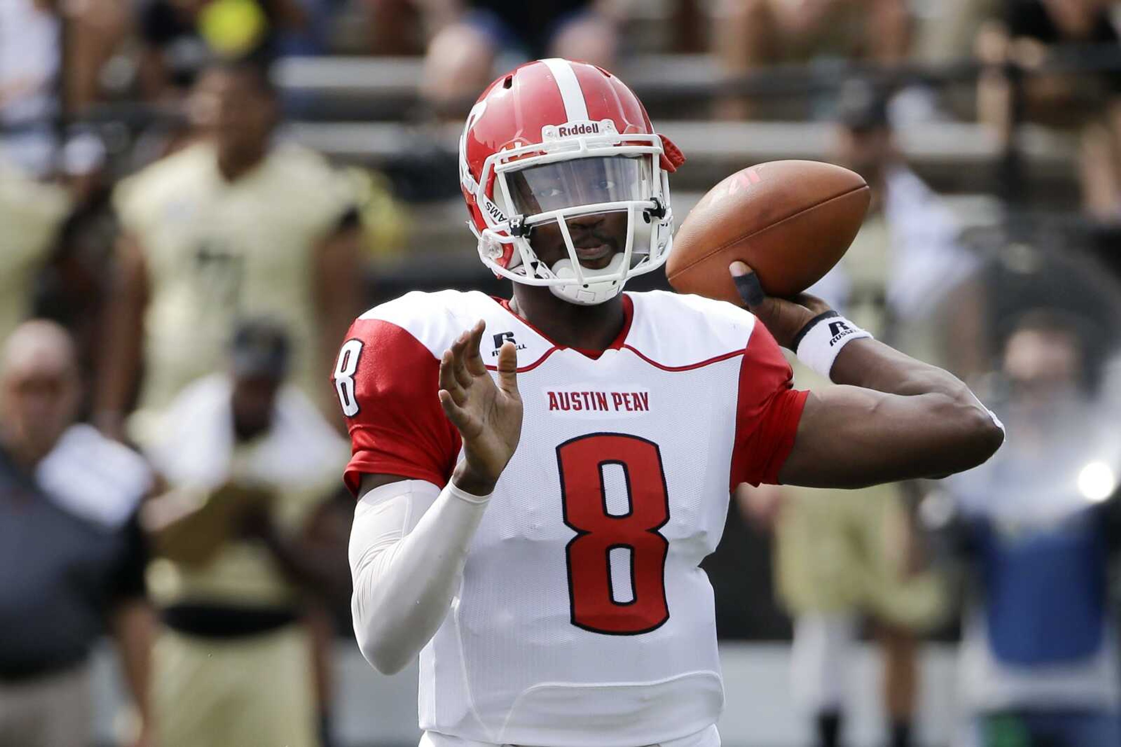 Austin Peay quarterback Trey Taylor passes against Vanderbilt in the first half of an NCAA college football game, Saturday, Sept. 19, 2015, in Nashville, Tenn. (AP Photo/Mark Humphrey)