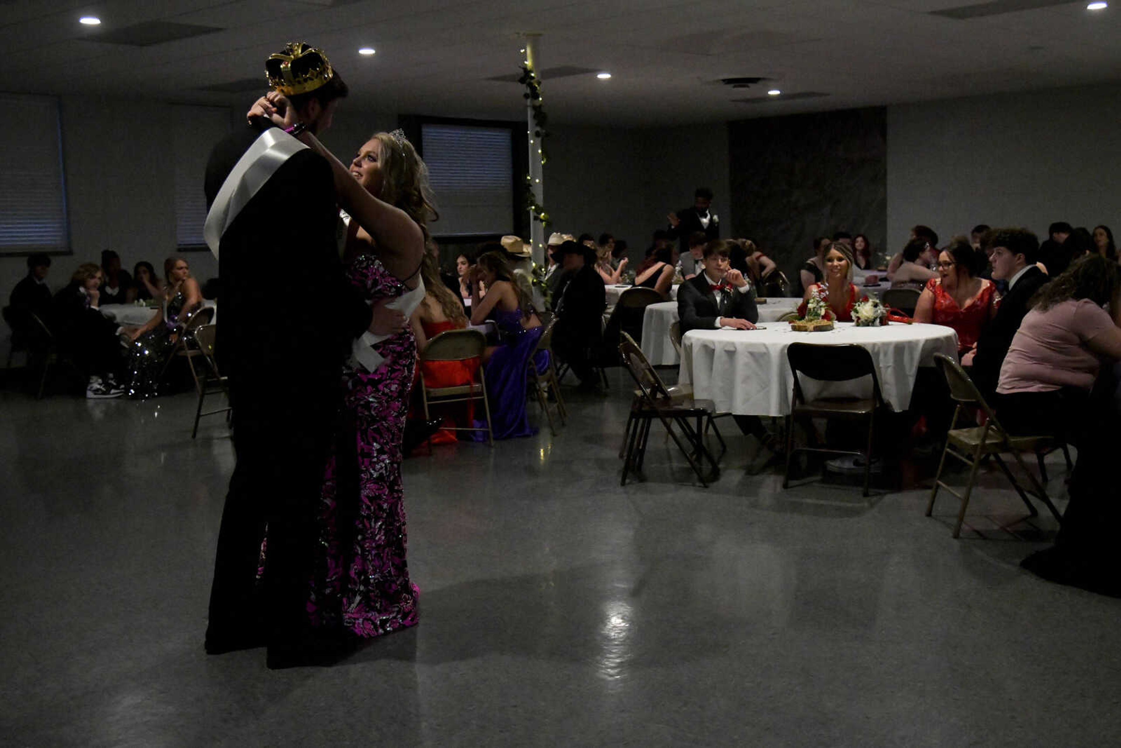 Prom king Cayden Beussink and prom queen Olivia Ourthat share the first dance during prom at the Front Porch in Scott City on Saturday, April 24, 2021.