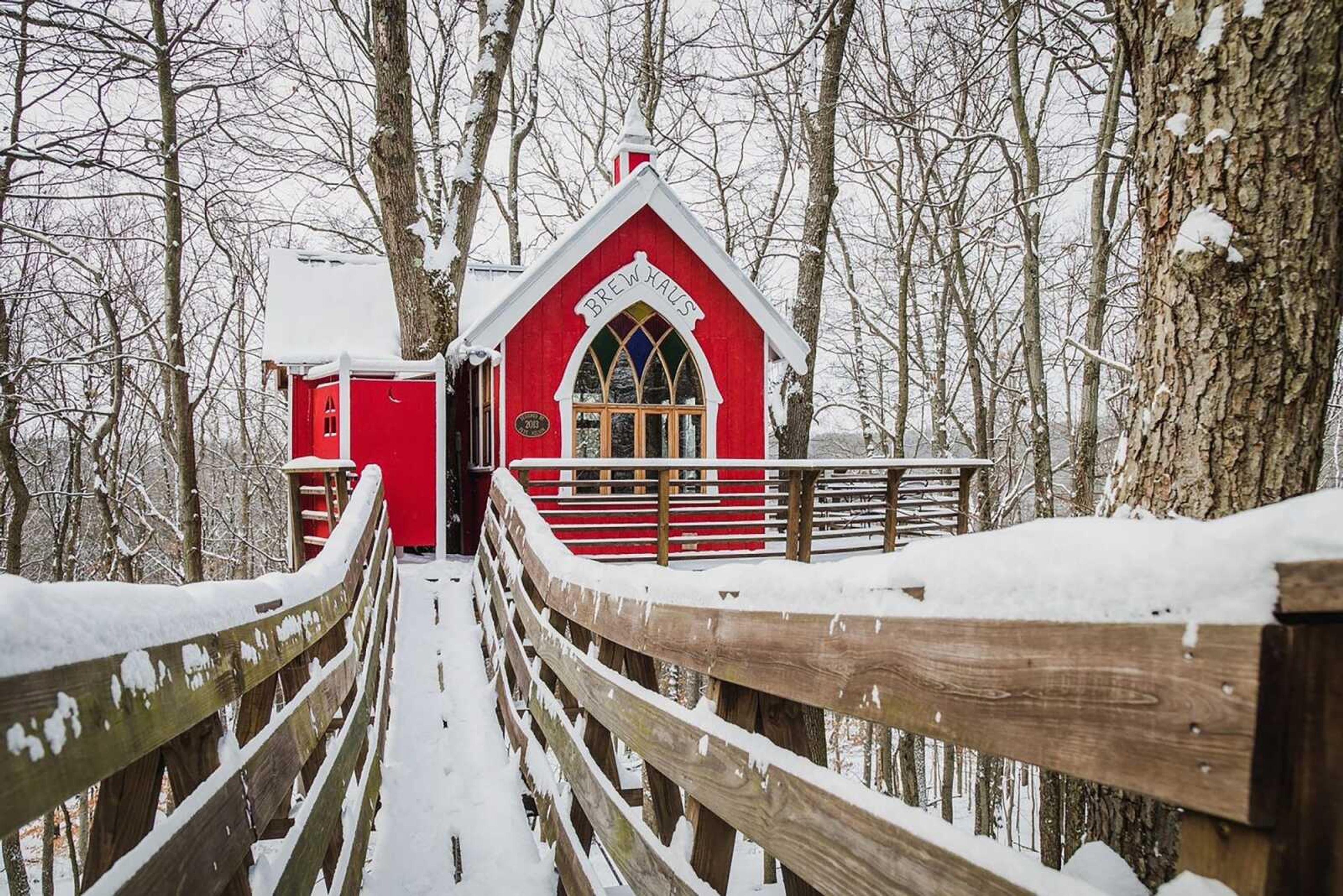 Little Red, a treehouse at The Mohicans Treehouse Resort and Wedding Venue in Glenmont, Ohio. Treehouses at this resort have heat and air conditioning and a full kitchen.