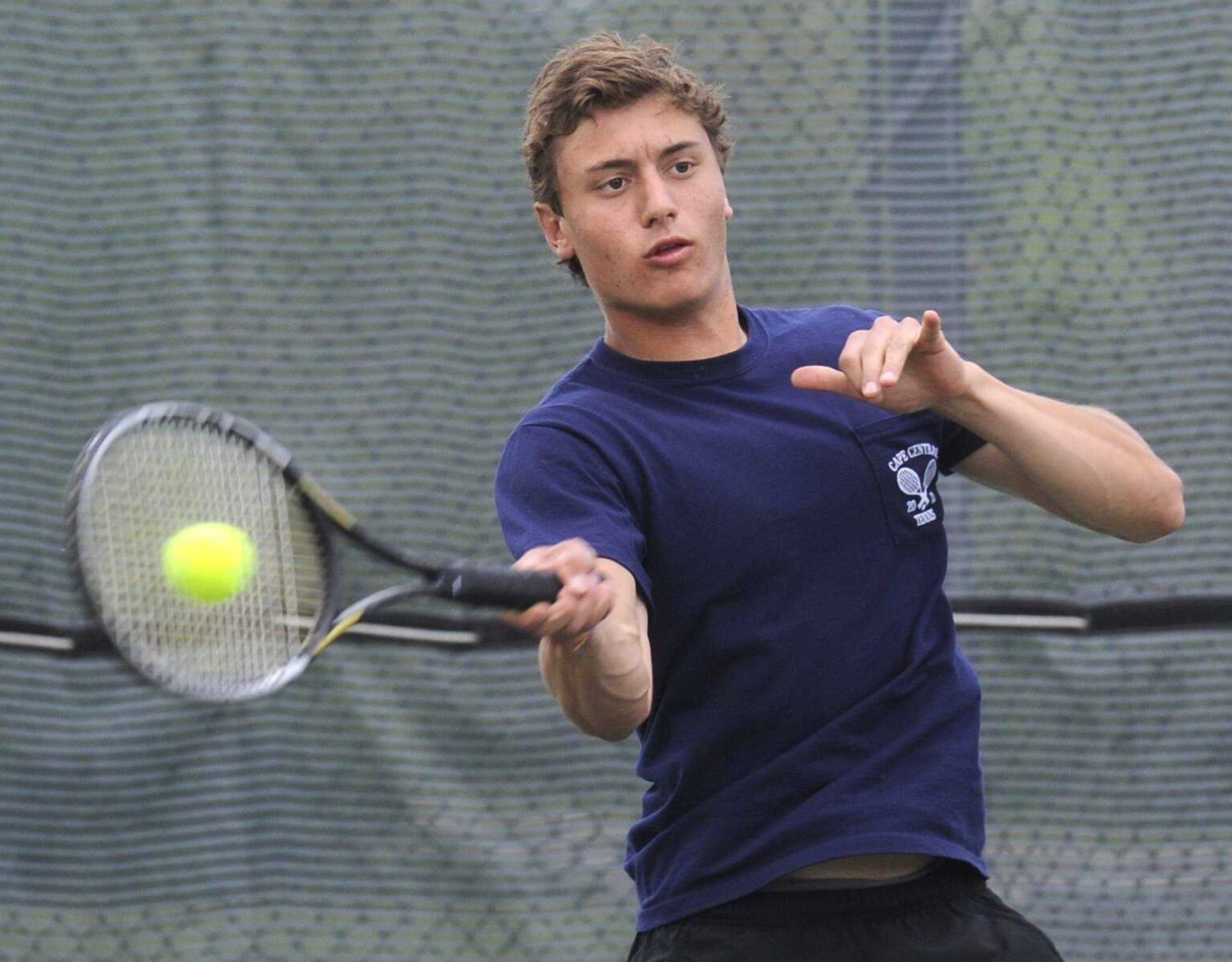 Central&#8217;s Pablo Jaramillo returns a shot in his No. 1 singles match against Oakville&#8217;s Adam Pleimann during the finals of the Class 2 District 1 tournament Tuesday at Southeast Missouri State University. Jaramillo won 6-0, 6-2 for the lone win in the Tigers&#8217; 5-1 loss. More photos from Tuesday&#8217;s matches can be viewed at semoball.com. (Fred Lynch)