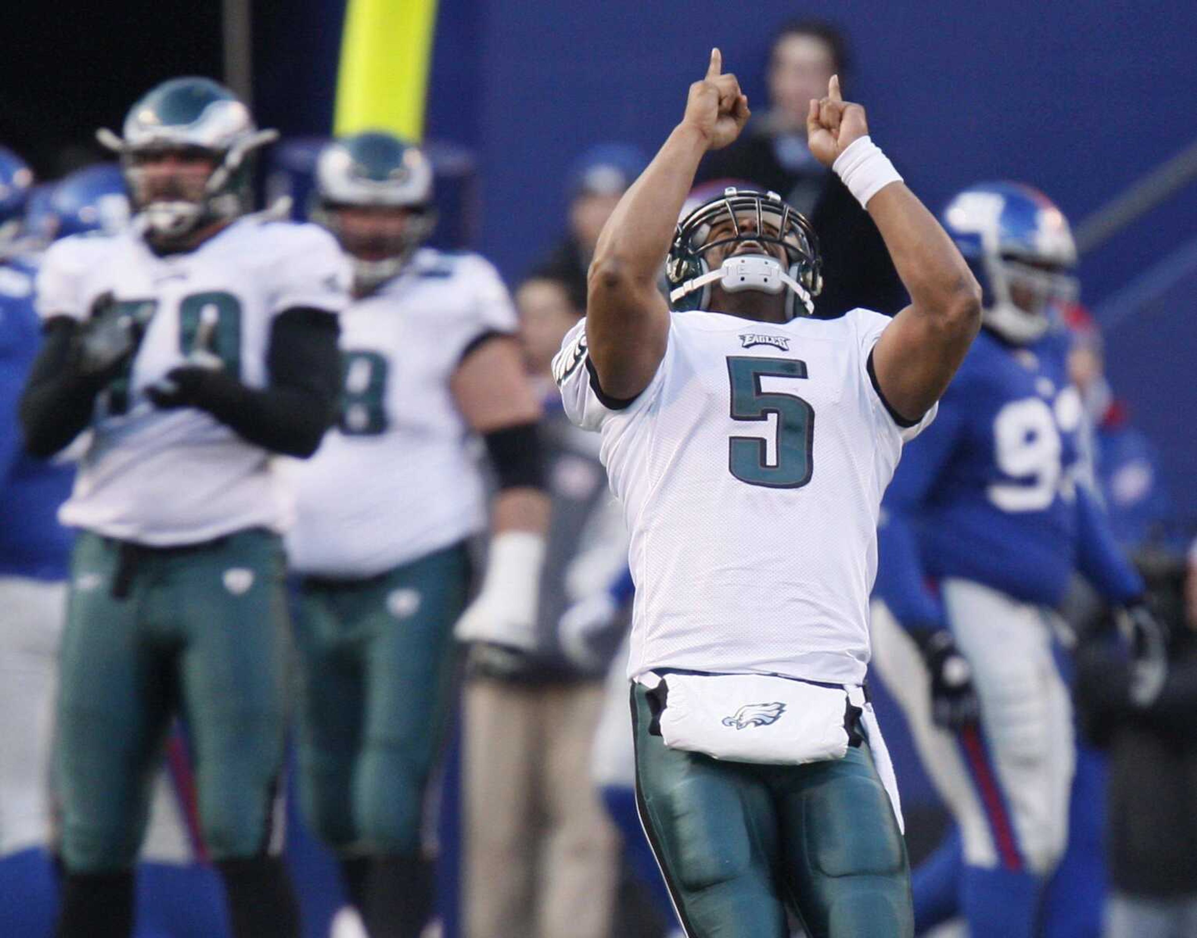 JULIE JACOBSON ~ Associated PressPhiladelphia quarterback Donovan McNabb celebrates after the Eagles scored a fourth-quarter touchdown against the New York Giants during their NFC divisional playoff game Sunday in East Rutherford, N.J.