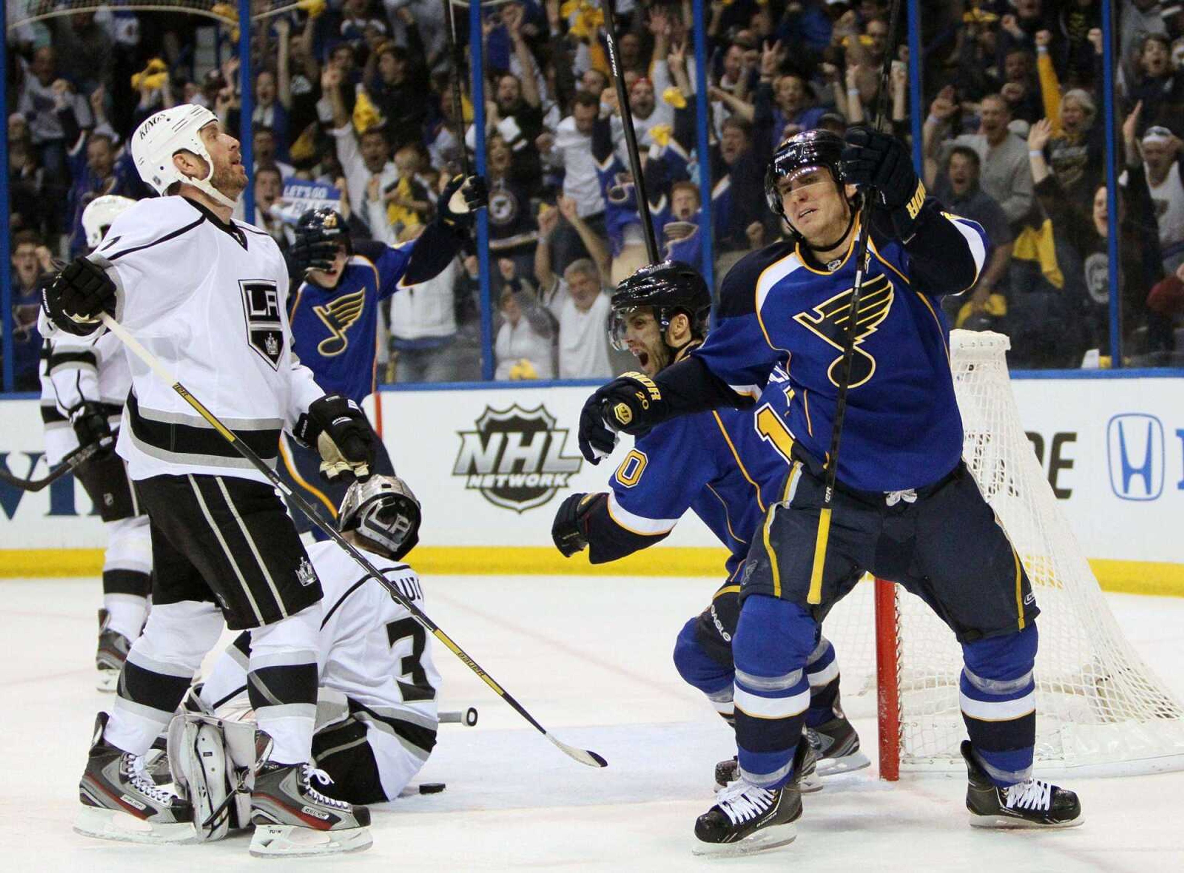 Blues left wing Alex Steen, right, and Andy McDonald celebrate after Steen&#8217;s first-period power-play goal in Game 1 of their first-round Stanley Cup playoff series Tuesday against Los Angeles. Steen&#8217;s overtime goal was the winner for St. Louis. Game 2 is scheduled for Thursday night. (Chris Lee ~ St. Louis Post-Dispatch)