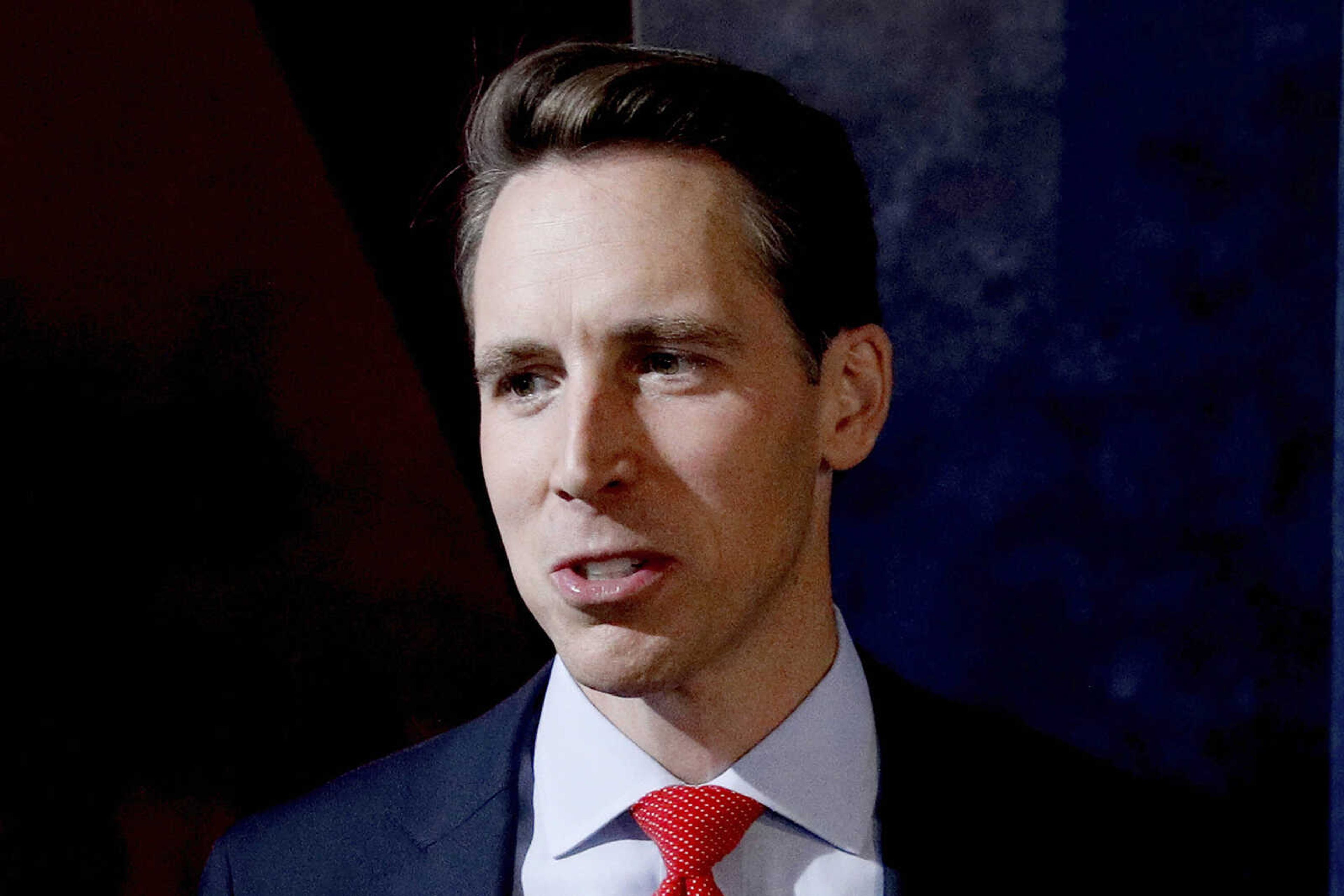 FILE - In this Oct. 25, 2018 file photo, Republican Missouri U.S. Senate candidate Josh Hawley talks to the media after a debate against incumbent Democratic Sen. Claire McCaskill in Kansas City, Mo. (AP Photo/Charlie Riedel, File)