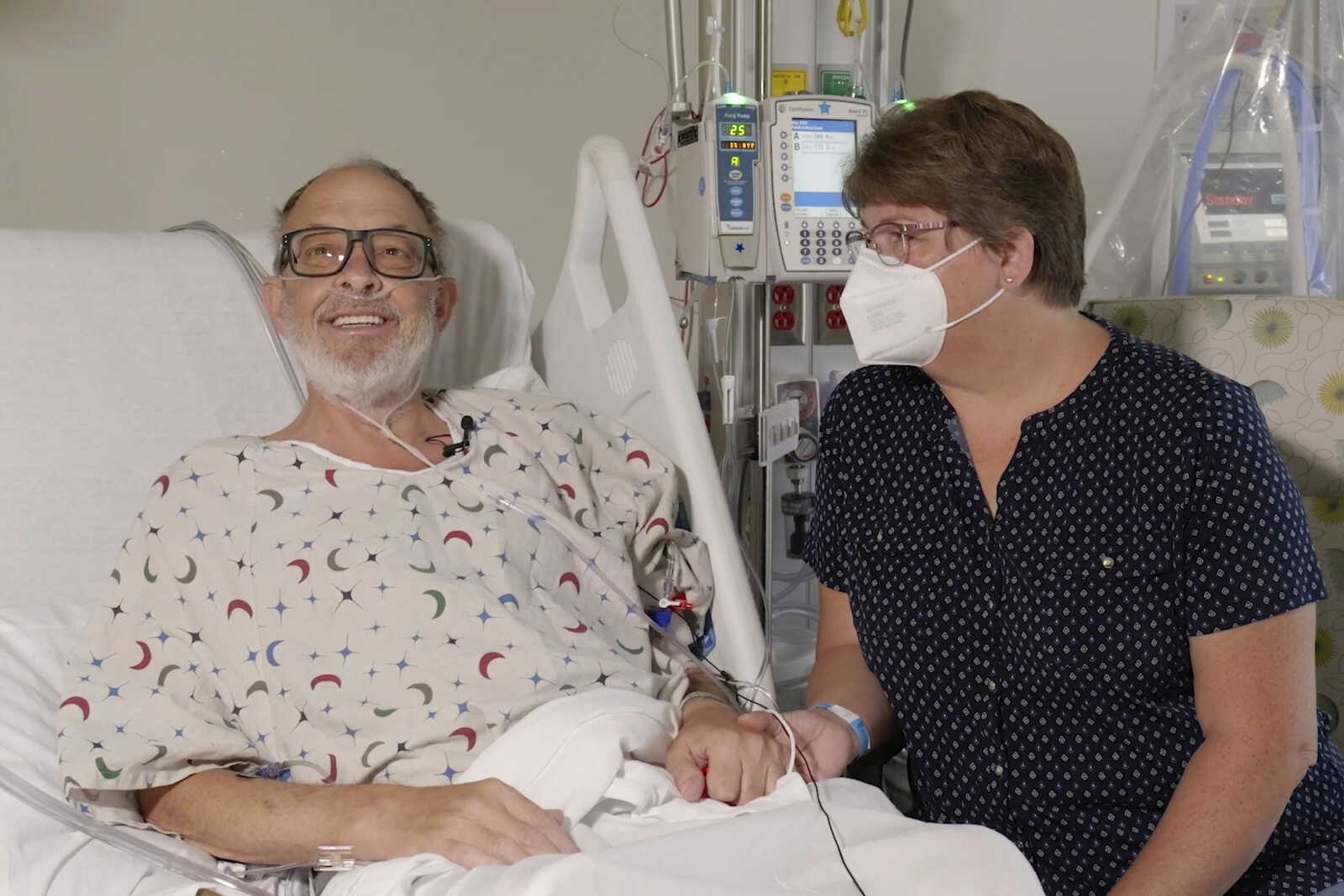 FILE - In this photo provided by the University of Maryland School of Medicine, Lawrence Faucette sits with wife, Ann, in the school's hospital in Baltimore, Md., in September 2023, before receiving a pig heart transplant. Lawrence Faucette, the second person to receive a transplanted heart from a pig has died, nearly six weeks after the highly experimental surgery, his doctors announced Tuesday, Oct. 31, 2023. (Mark Teske/University of Maryland School of Medicine via AP, File)