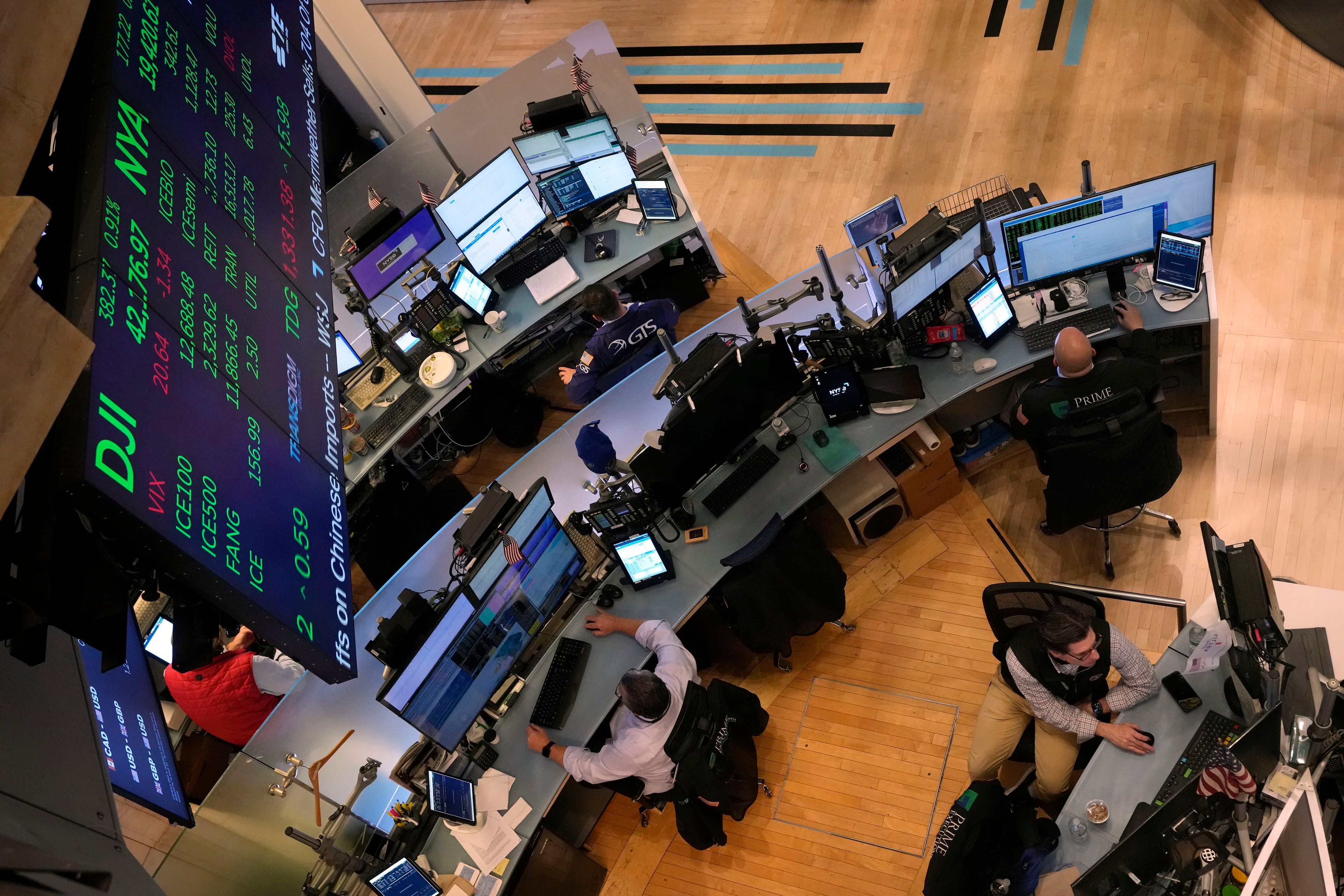 Traders work on the floor of the New York Stock Exchange, Tuesday, Nov. 5, 2024. (AP Photo/Richard Drew)