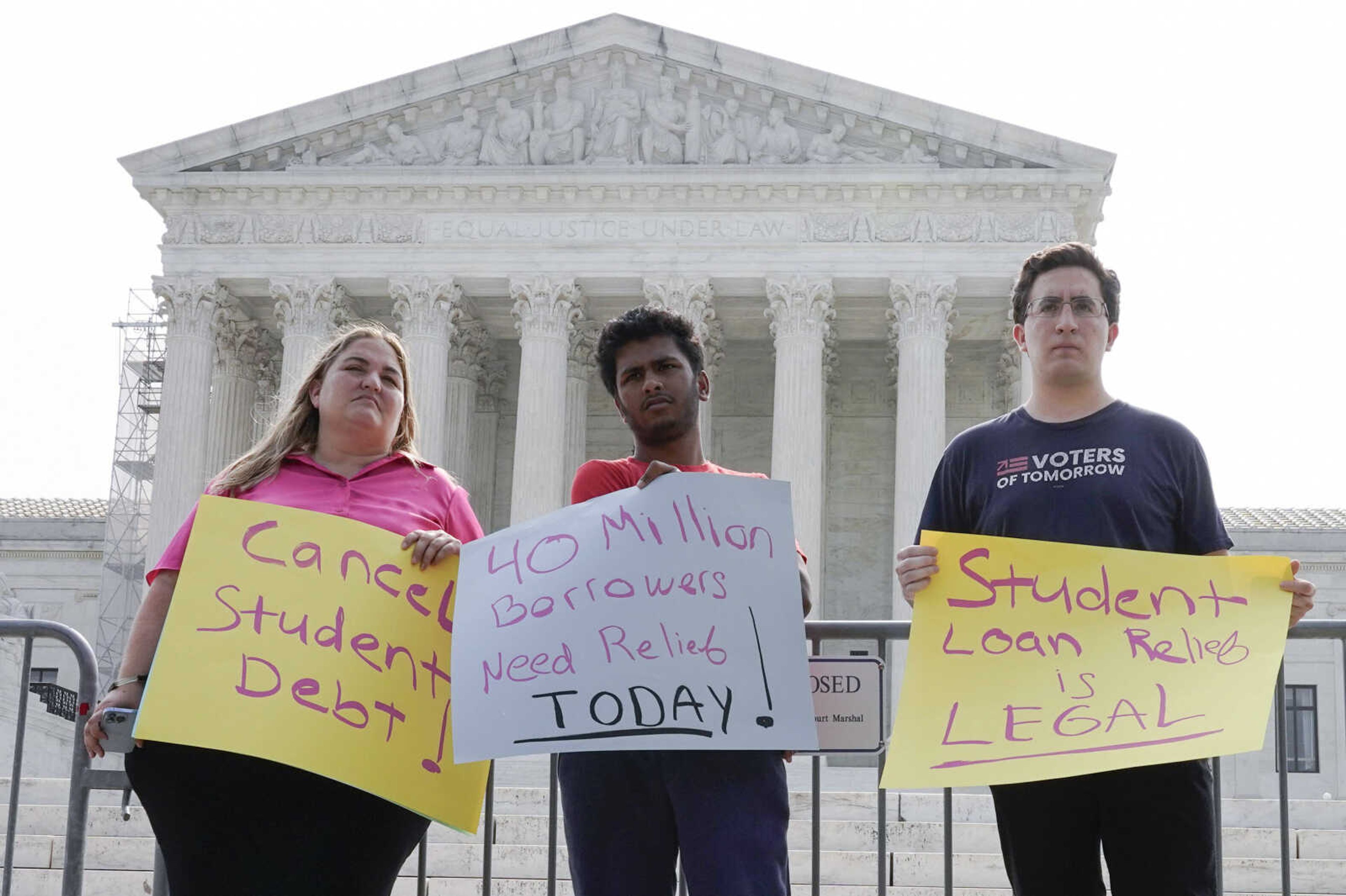 People in favor of canceling student debt protest outside the Supreme Court, Friday, June 30, 2023, as decisions are expected in Washington. 