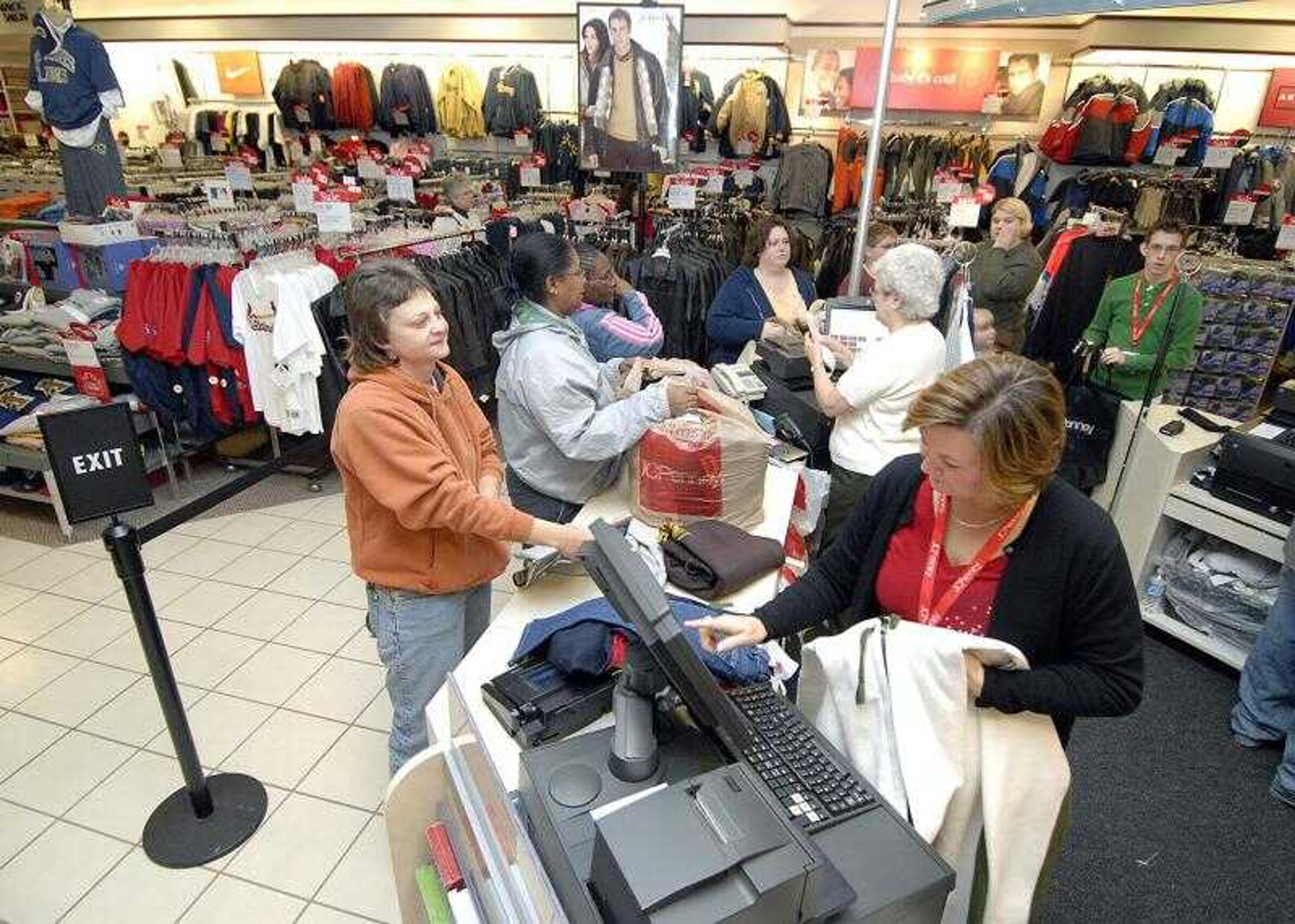 Customers lined up to pay for their purchases at the J.C. Penney's store at West Park Mall at about 5:30 a.m. on Black Friday, the day after Thanksgiving, considered to be one of the busiest shopping days of the day. (Don Frazier)