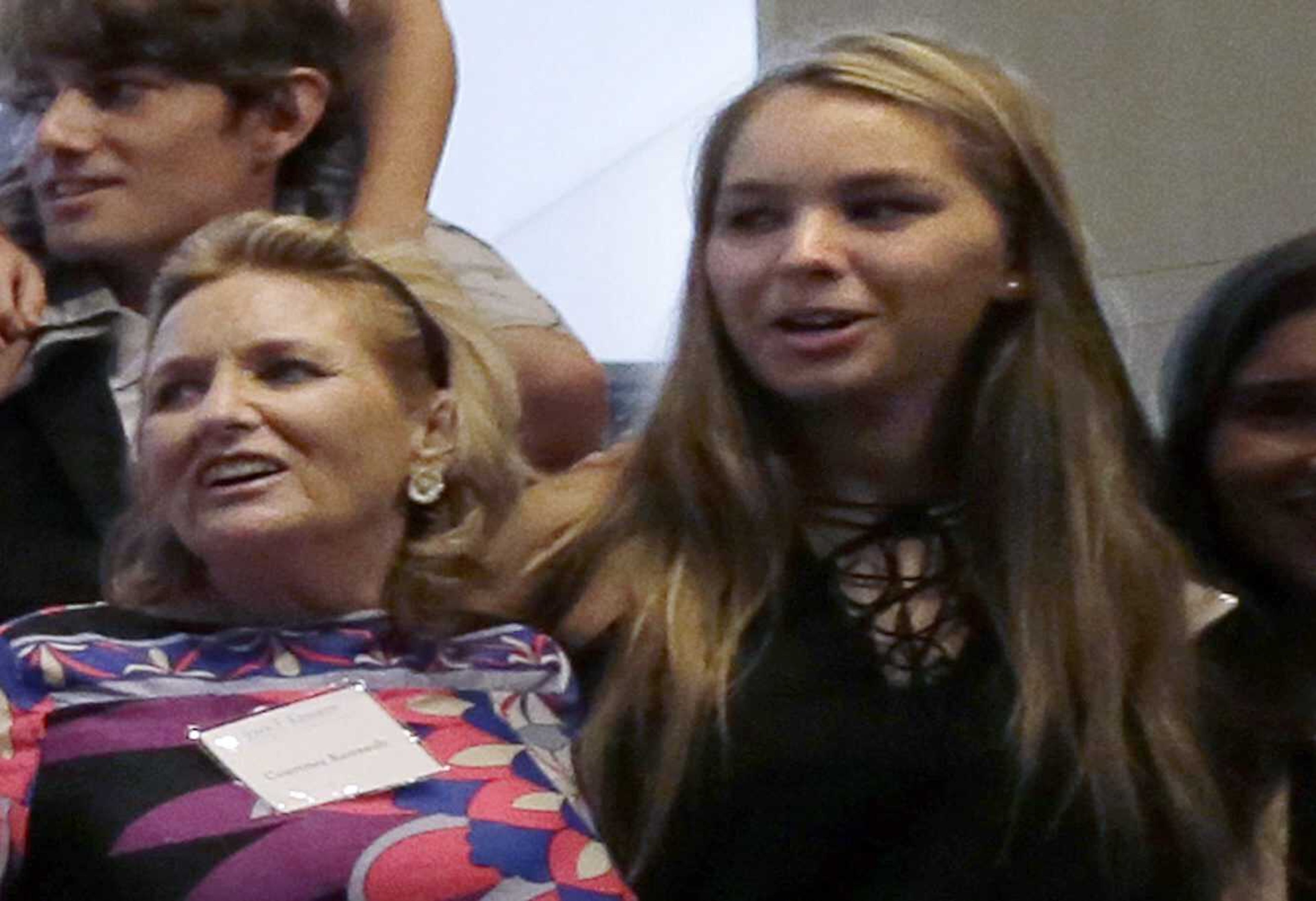 In this Sept. 20, 2016, photo, Saoirse Kennedy Hill, right, granddaughter of Ethel Kennedy and her late husband Robert F. Kennedy, poses for a family group photo with her mother Courtney Kennedy Hill, left, after a ceremony for naming the Robert Kennedy Navy Ship at the John F. Kennedy Presidential Library, in Boston. Saoirse Kennedy Hill died Thursday, Aug. 1, 2019, at the Kennedy compound in Hyannis Port, Mass. She was 22. (AP Photo/Elise Amendola)