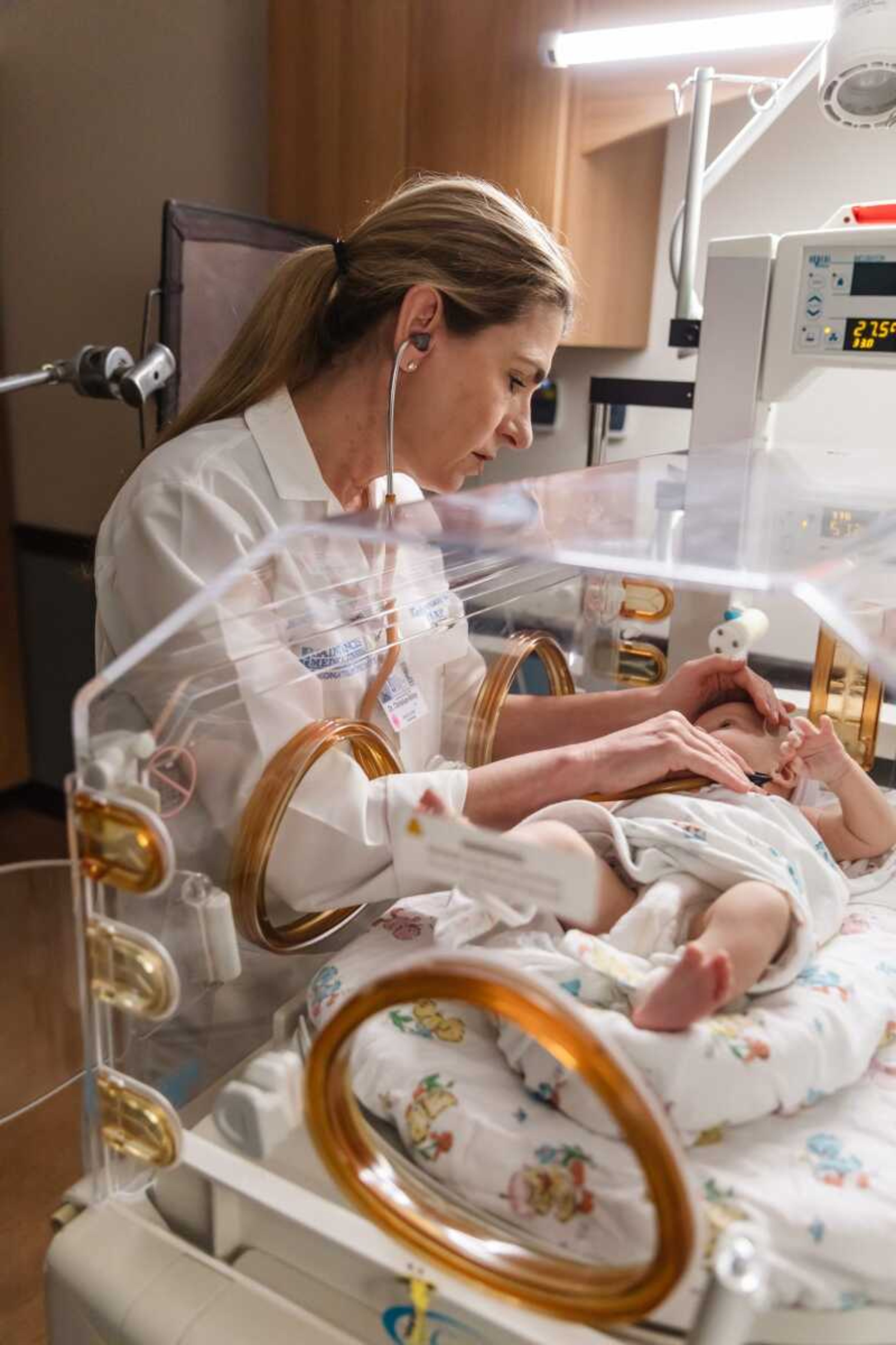 Dr. Karlyle Christian-Ritter treats a baby in the Saint Francis NICU.