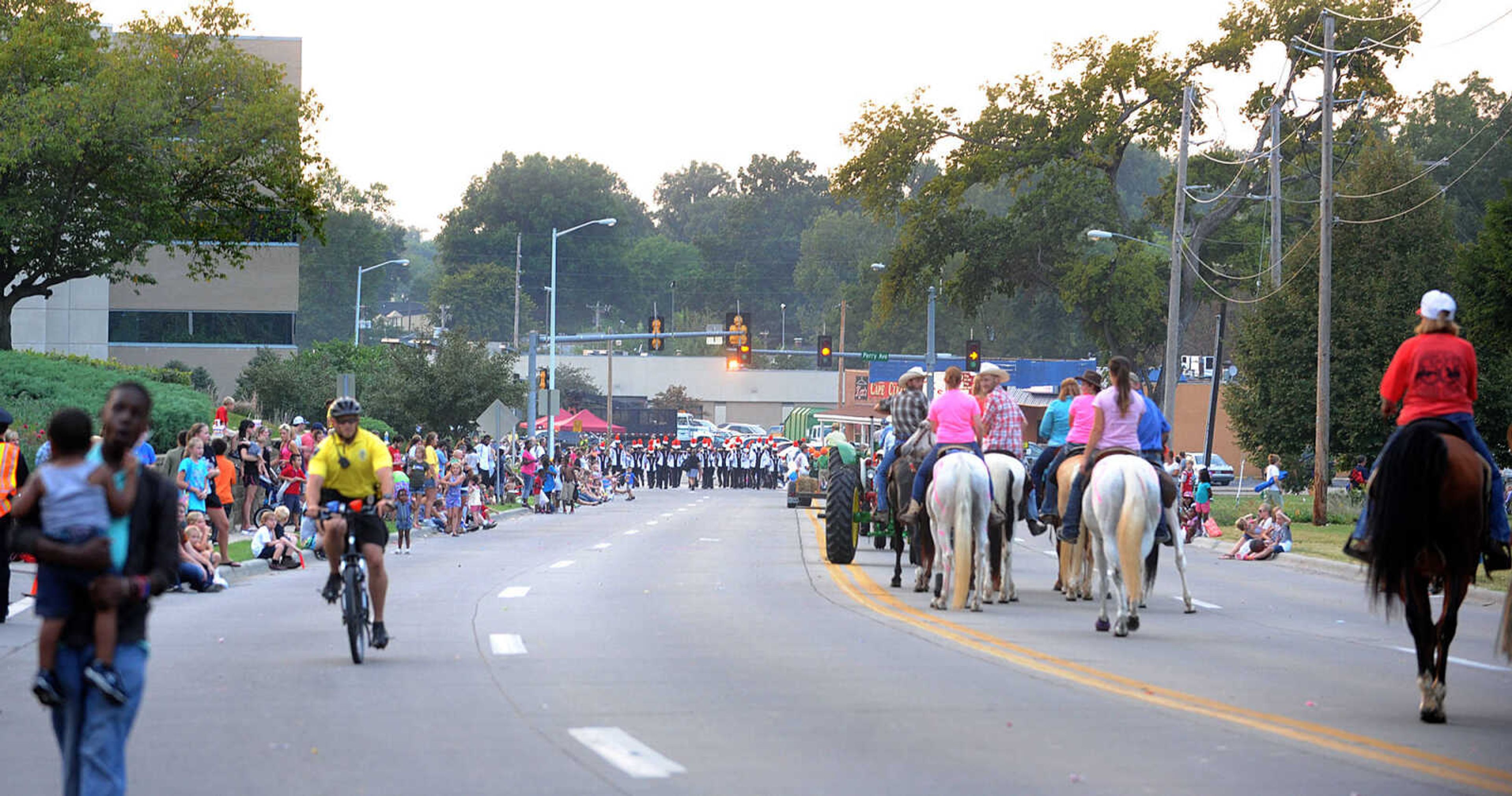 LAURA SIMON ~ lsimon@semissourian.com

The SEMO District Fair Parade moves along Broadway towards Arena Park, Monday, Sept. 9, 2013, in Cape Girardeau.