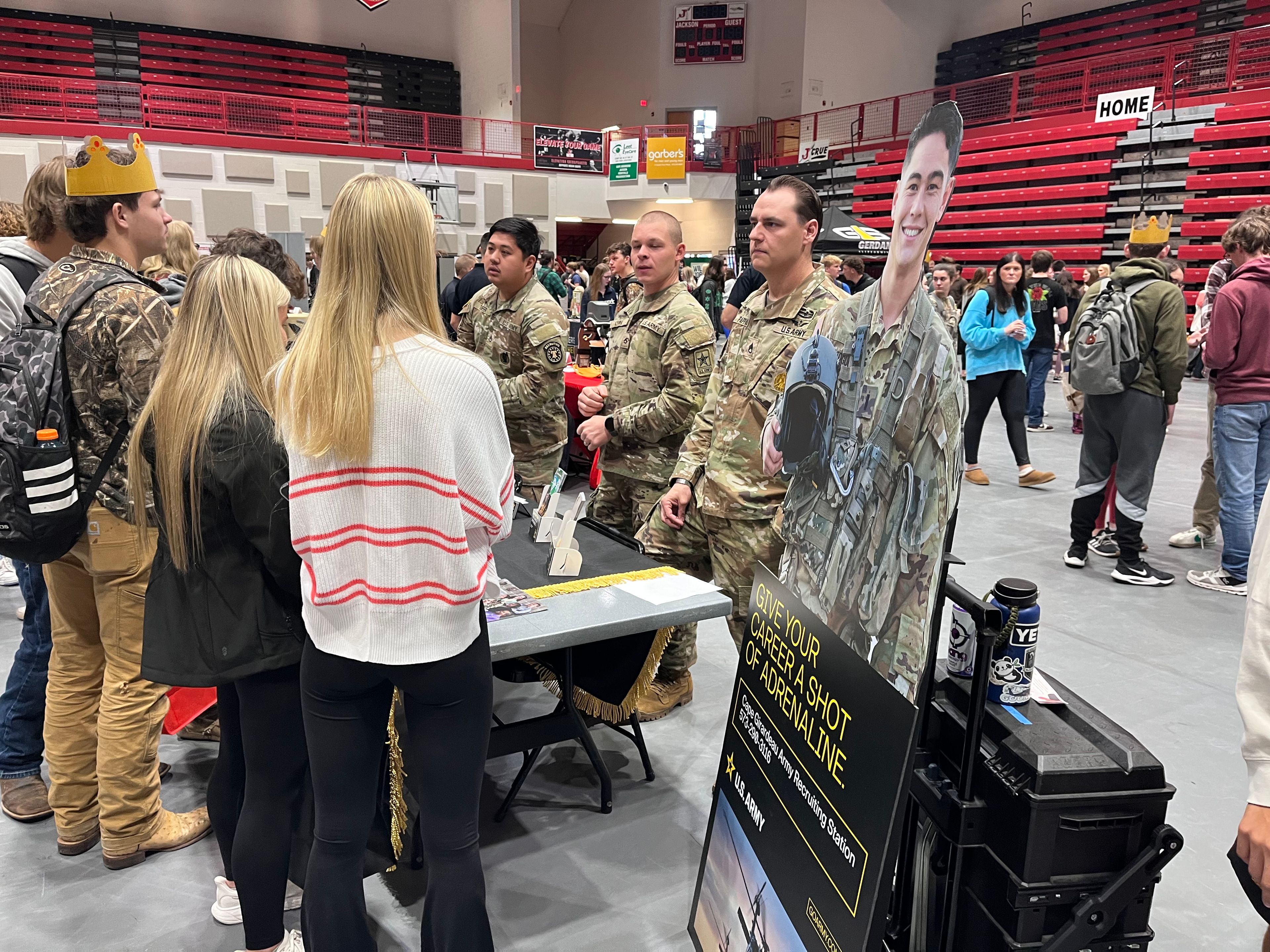 Jackson High School students speak with representatives of the United States Army National Guard during the annual Jackson Opportunities in Business (J.O.B.) Fair on Wednesday at JHS. 