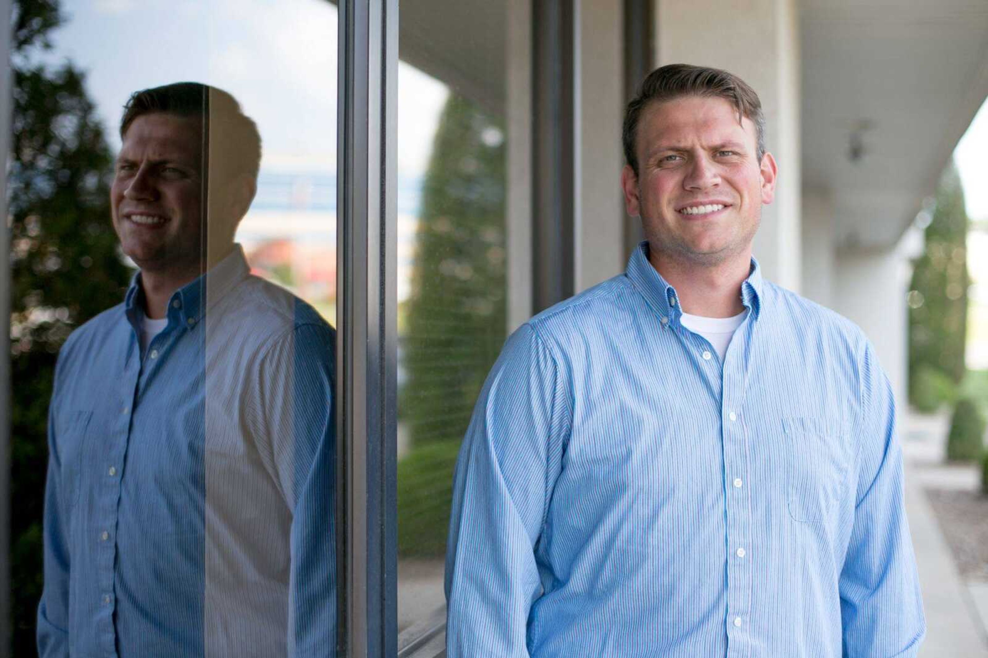 Cutline:Joey Keys with the Better Business Bureau poses for a photo in Cape Girardeau. (Glenn Landberg)