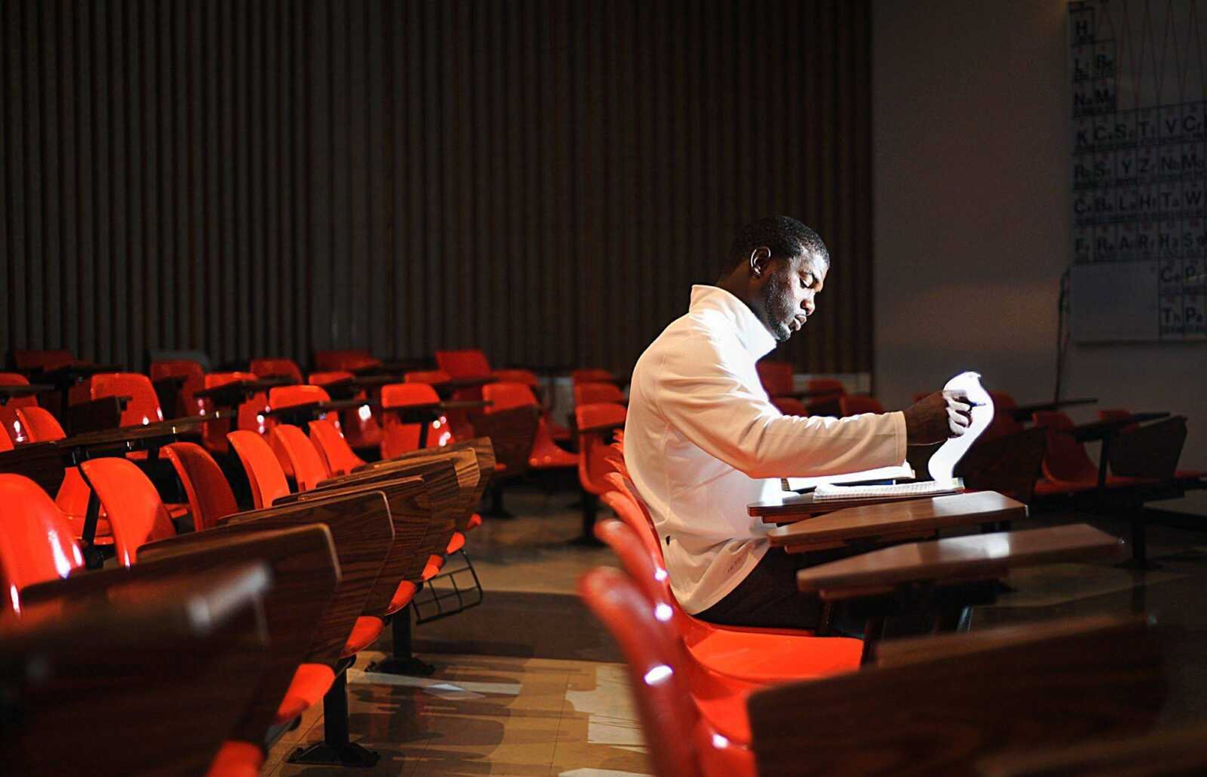 Former Southeast Missouri State and NFL football player Willie Ponder sits inside his classroom last week at Rhodes Hall of Science. (LAURA SIMON ~ lsimon@semissourian.com)