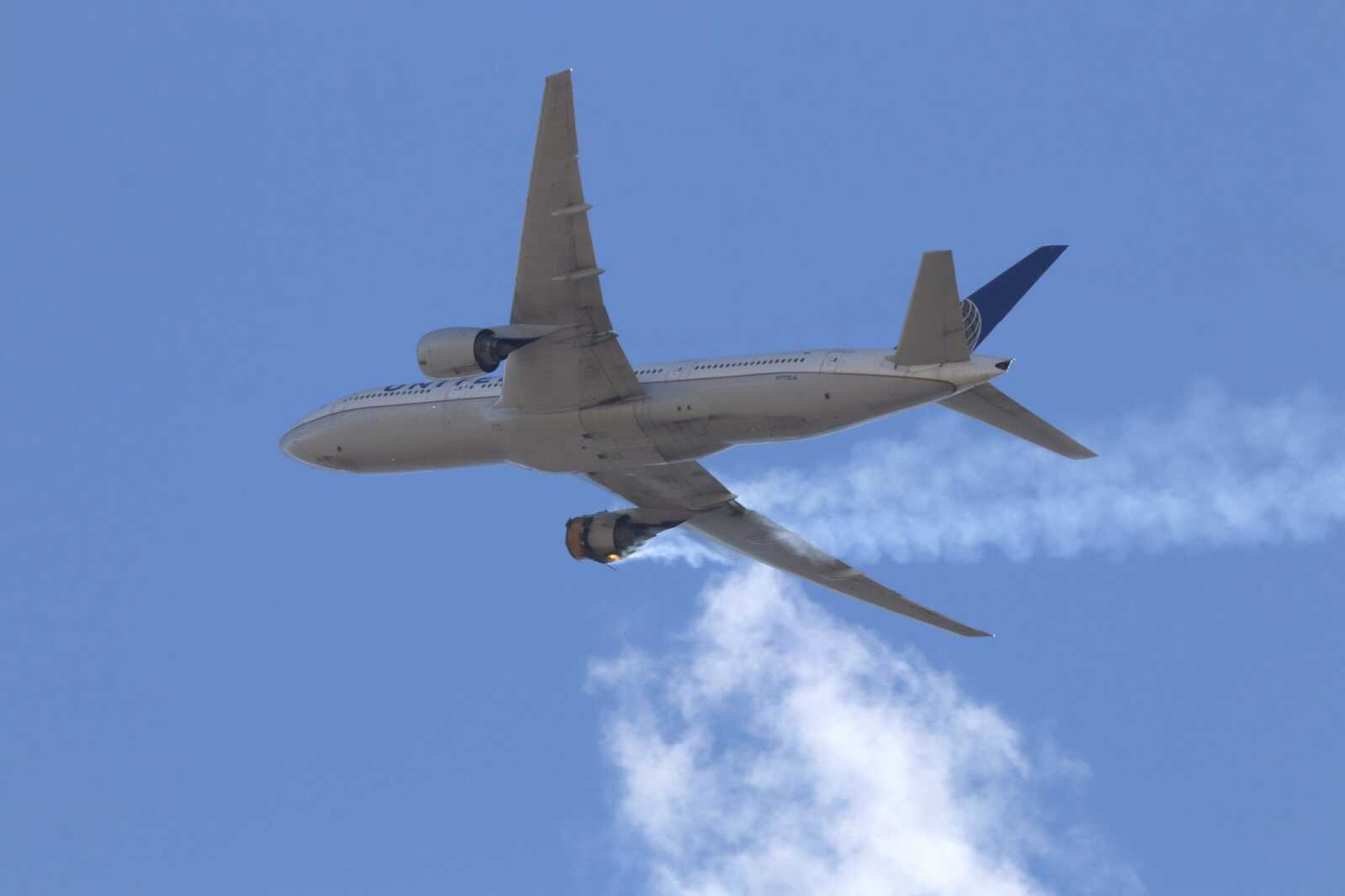 United Airlines Flight 328 approaches Denver International Airport after experiencing "a right-engine failure" shortly after takeoff Saturday from Denver.