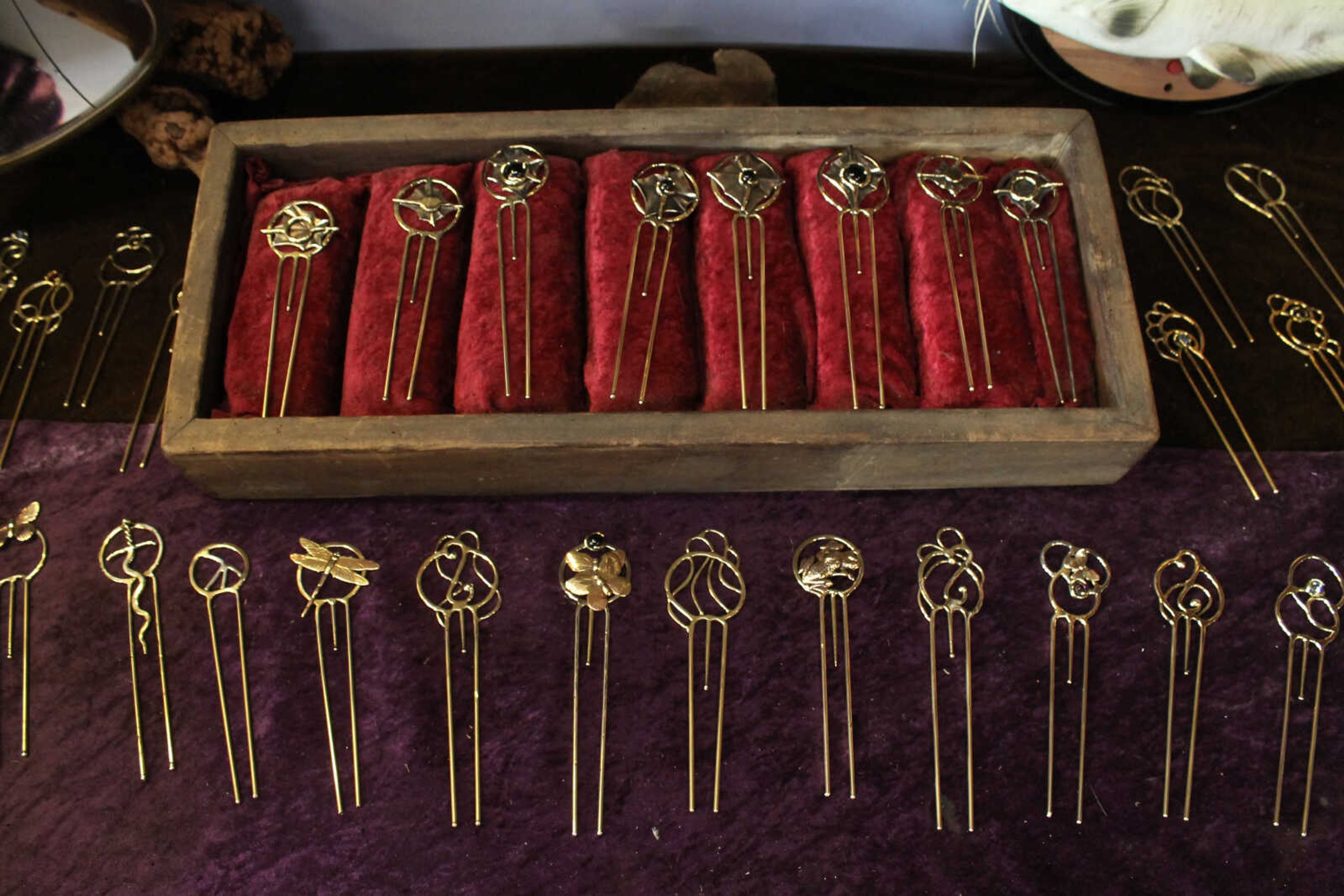 Emily Priddy ~ epriddy@semissourian.com
Some of Dave Dardis' metal hair sticks are displayed for sale Friday, March 10, 2017, at Rainmaker Studio in Makanda, Illinois.