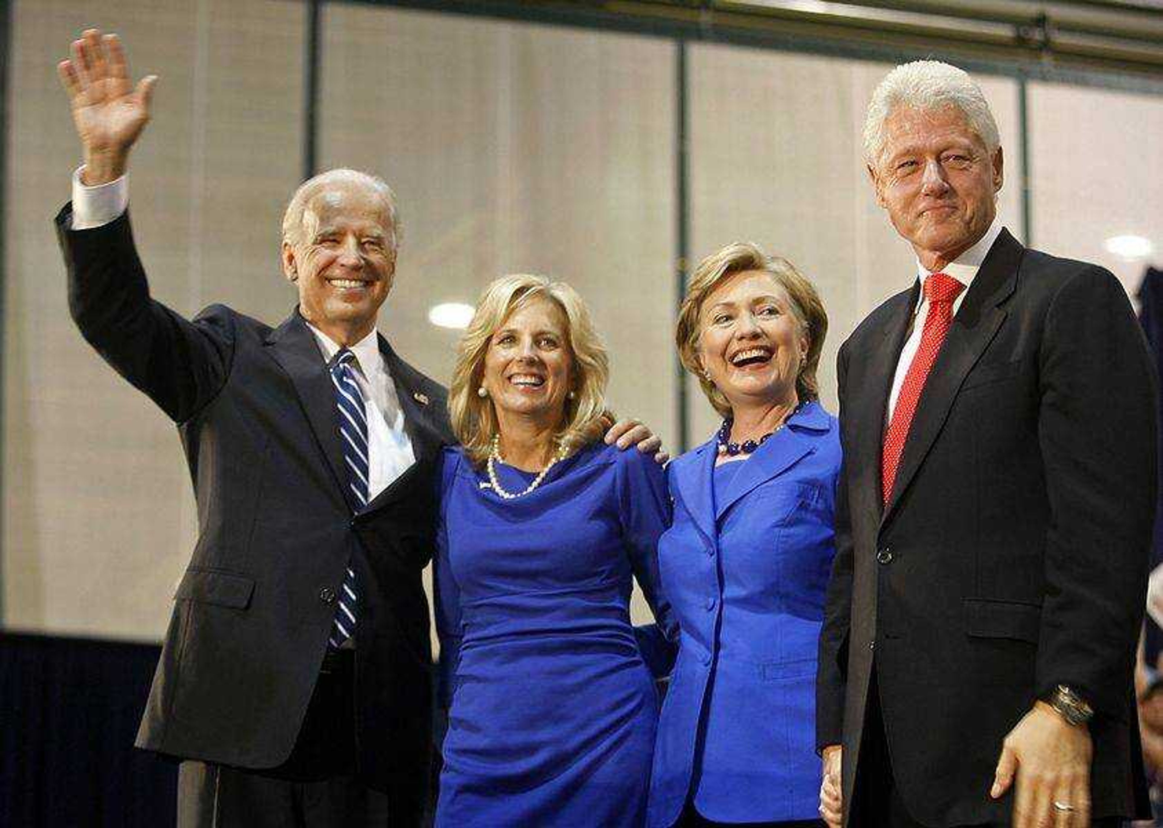 Democratic vice presidential candidate, Sen. Joe Biden, D-Del., left, his wife Jill Biden, Sen. Hillary Rodham Clinton, D-N.Y. and her husband, former President Bill Clinton, right, wave to the crowd during a campaign rally in Scranton, Pa. Sunday, Oct. 12, 2008. (AP Photo/Jimmy May)