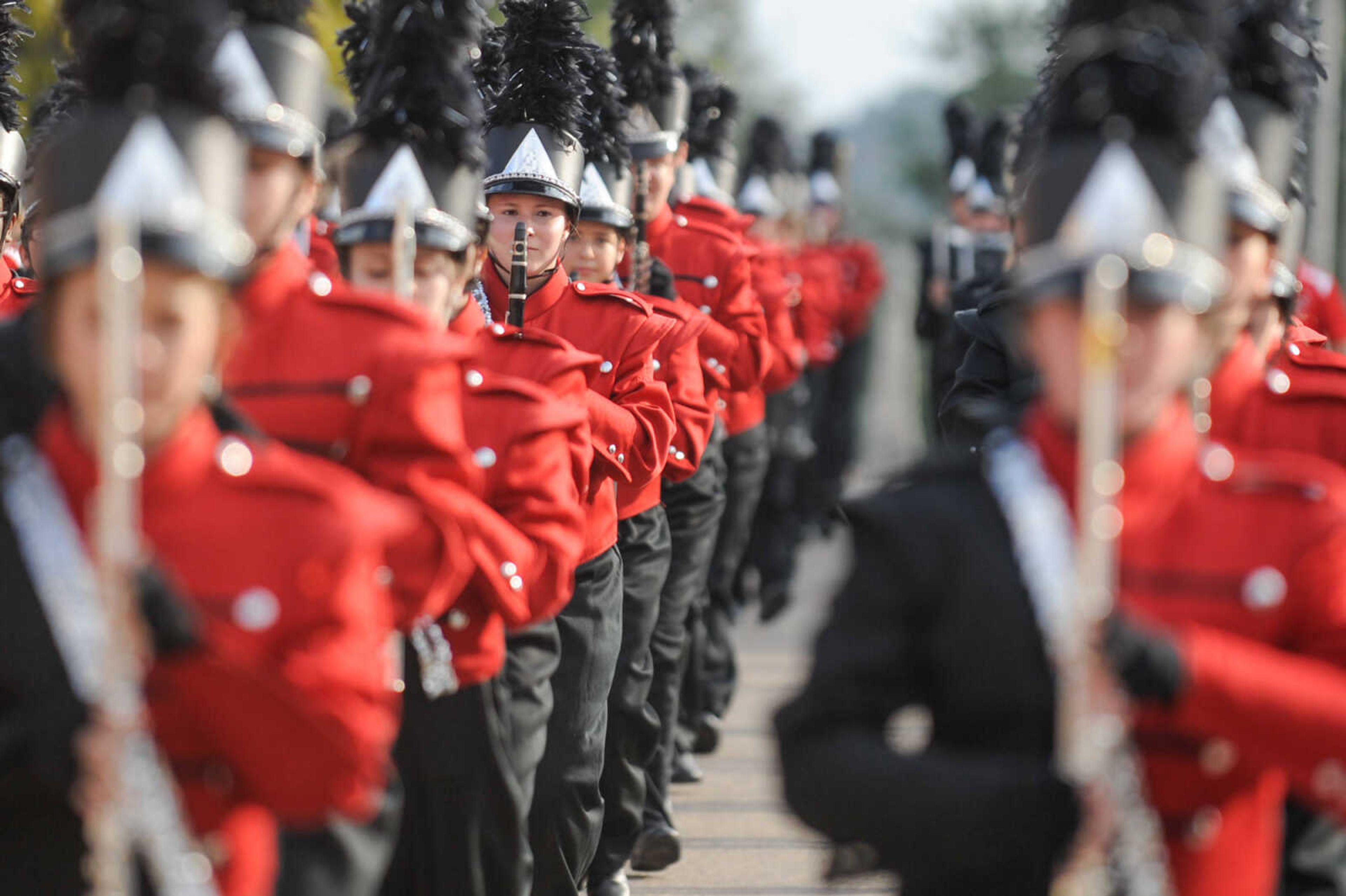 GLENN LANDBERG ~ glandberg@semissourian.com

Members of the Jackson High School Marching Chiefs move in formation down High Street in Uptown Jackson during the Jackson Band Festival parade Tuesday, Oct. 6, 2015.