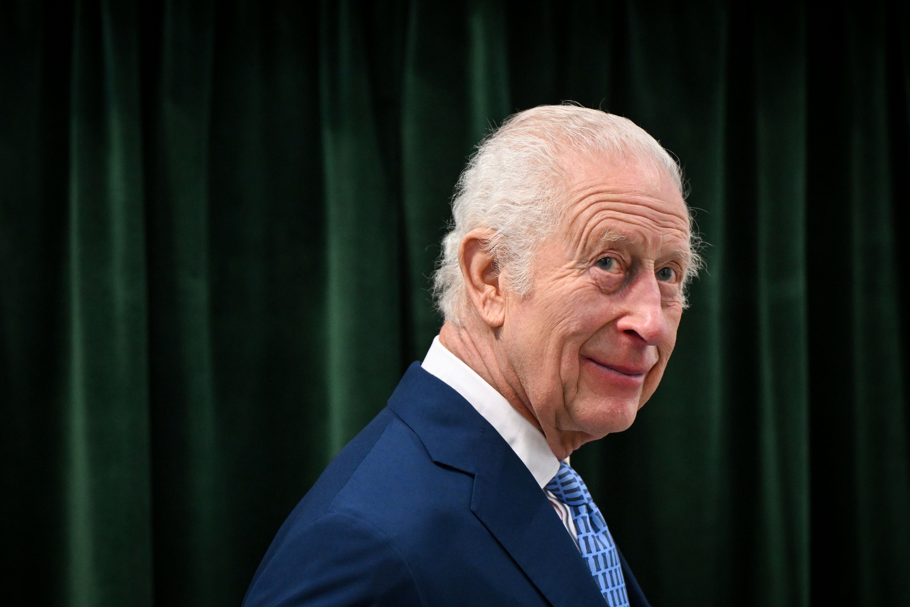 Britain's King Charles III smiles as he visits the Coronation Food Project hub, located at the Deptford Trading Estate, in South East London, Thursday, Nov. 14, 2024, on his 76th birthday and the first anniversary of the Coronation Food Project. (Justin Tallis/Pool Photo via AP)