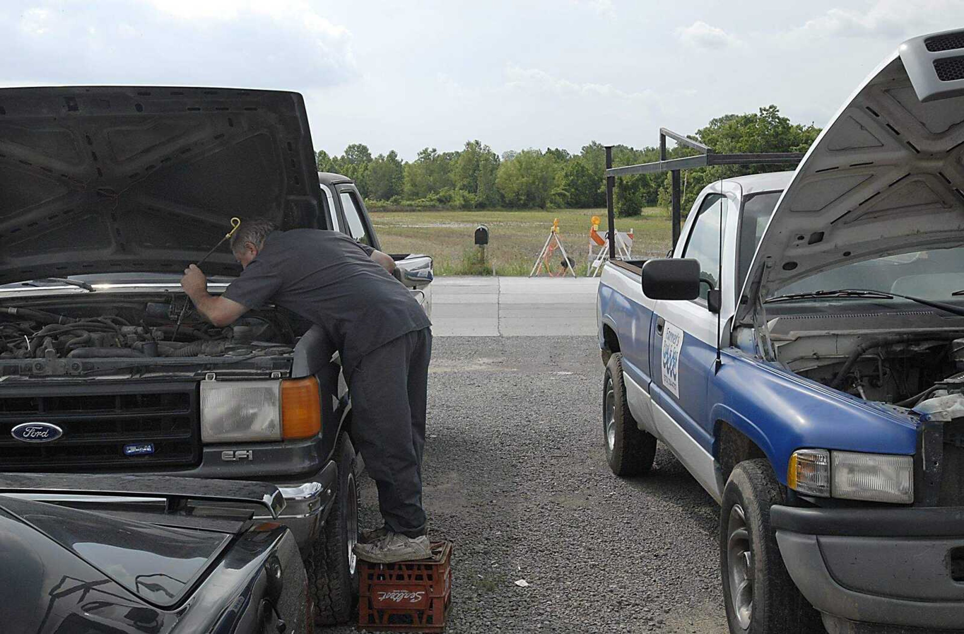 KIT DOYLE ~ kdoyle@semissourian.com
Joe Kitchen worked on an F-150 Monday afternoon, June 16, 2008, at his shop, Kitchen Automotive, on South Sprigg St. Kitchen grew up in Smelterville, an area south of Southern Expressway, where a vibrant community used to almost be independent of the city, as Kitchen describes it. Smelterville was bought out after 1993 floods.