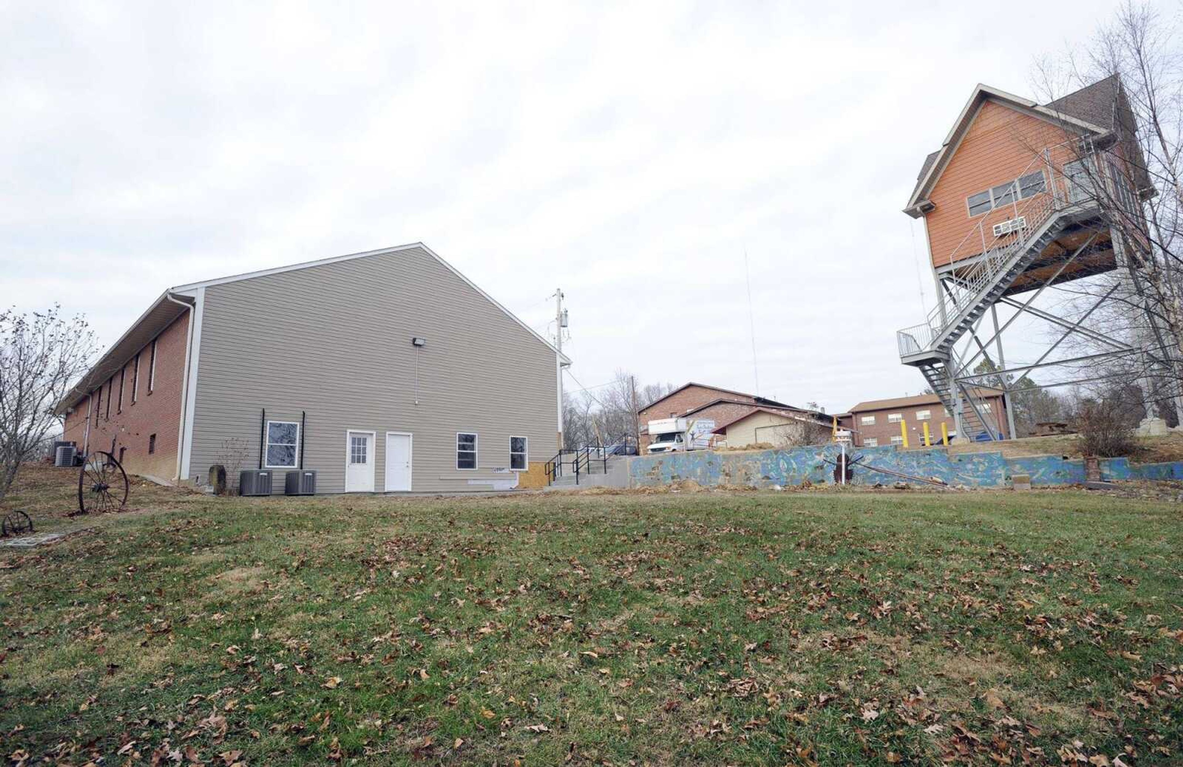 The temporary Phase 1 facility of Adult and Teen Challenge of Mid-America is in the lower level of the chapel, left, across from the prayer tower, as seen Friday.