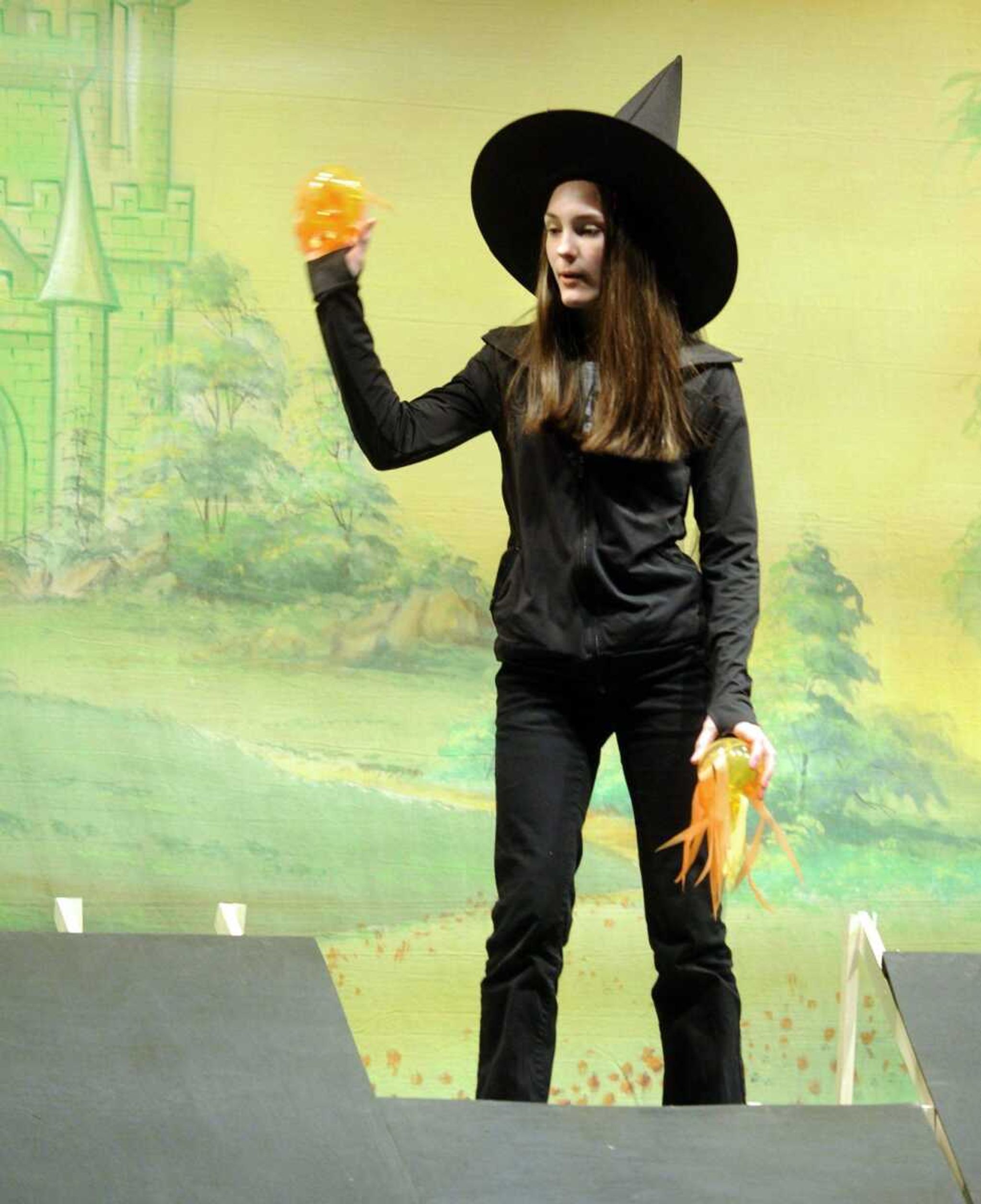 Danielle Childers portrays the Wicked Witch of the West in the Saxony Lutheran High School production of &#8220;The Wizard of Oz.&#8221;