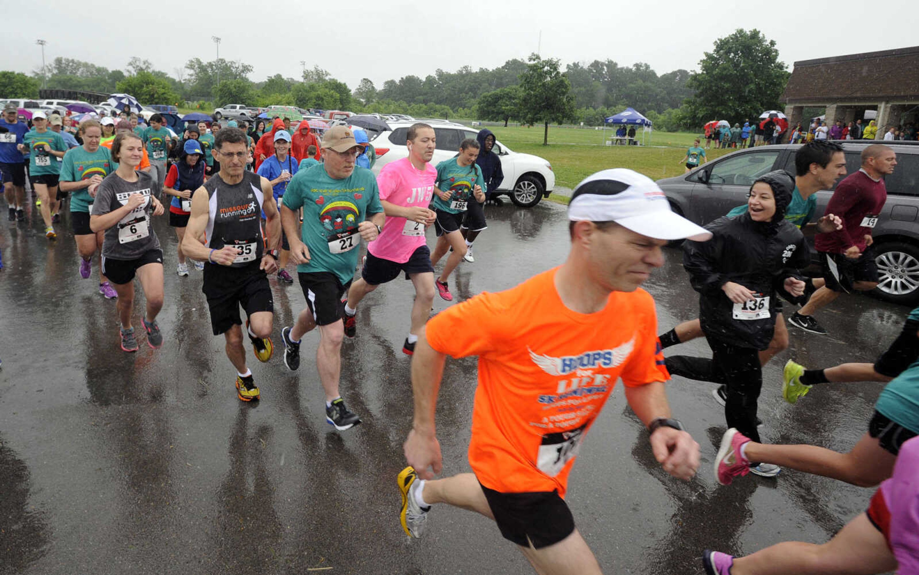 FRED LYNCH ~ flynch@semissourian.com
Runners begin the second annual Jacque Waller 5K run Saturday, June 1, 2013 at Shawnee Park in Cape Girardeau.