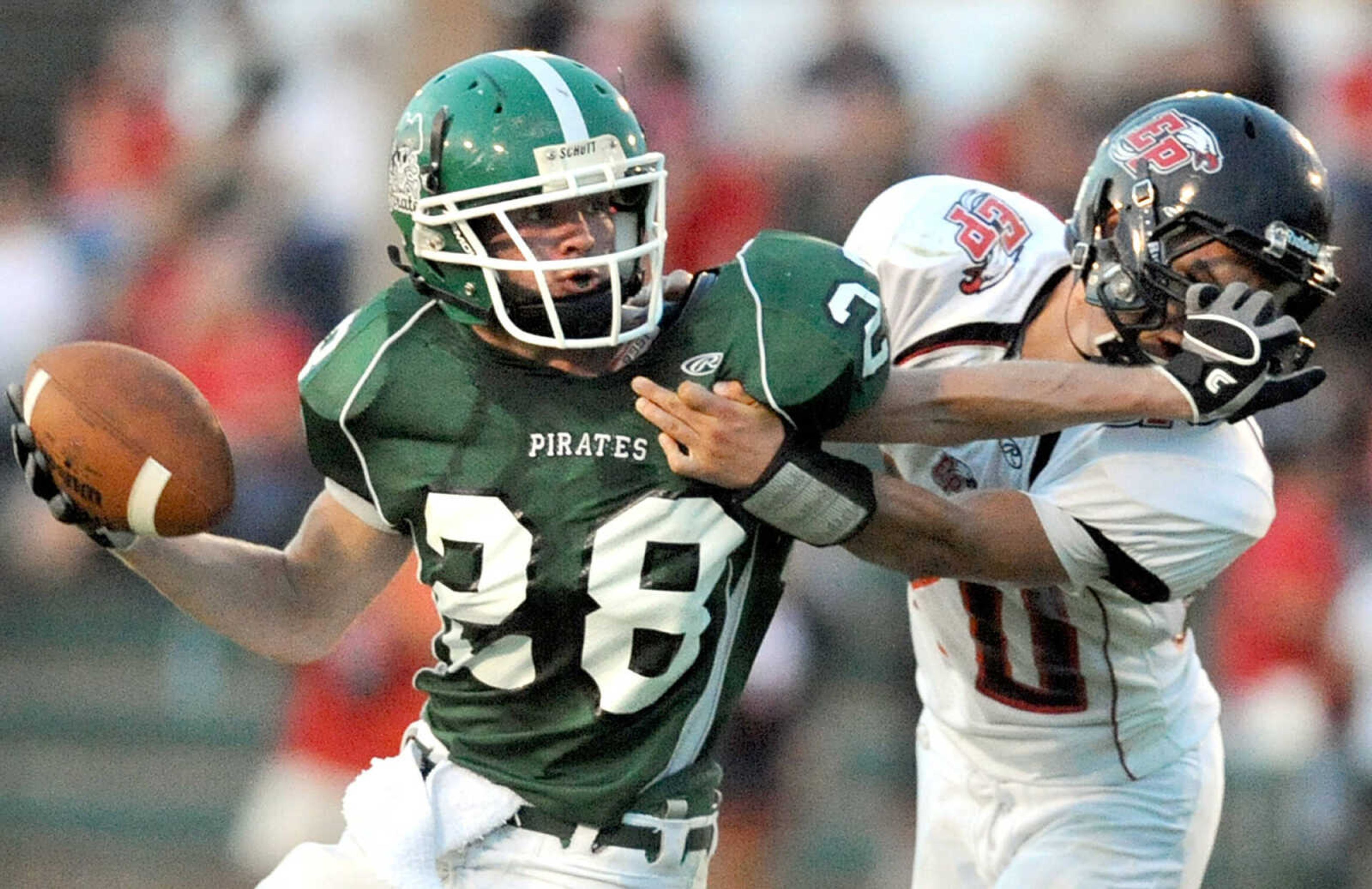 Perryville's Levi Zook pushes past East Prairie's Adrian Soto in the second quarter of their game Friday, Aug. 24, 2012 in Perryville. Perryville won 41-0. (Laura Simon)