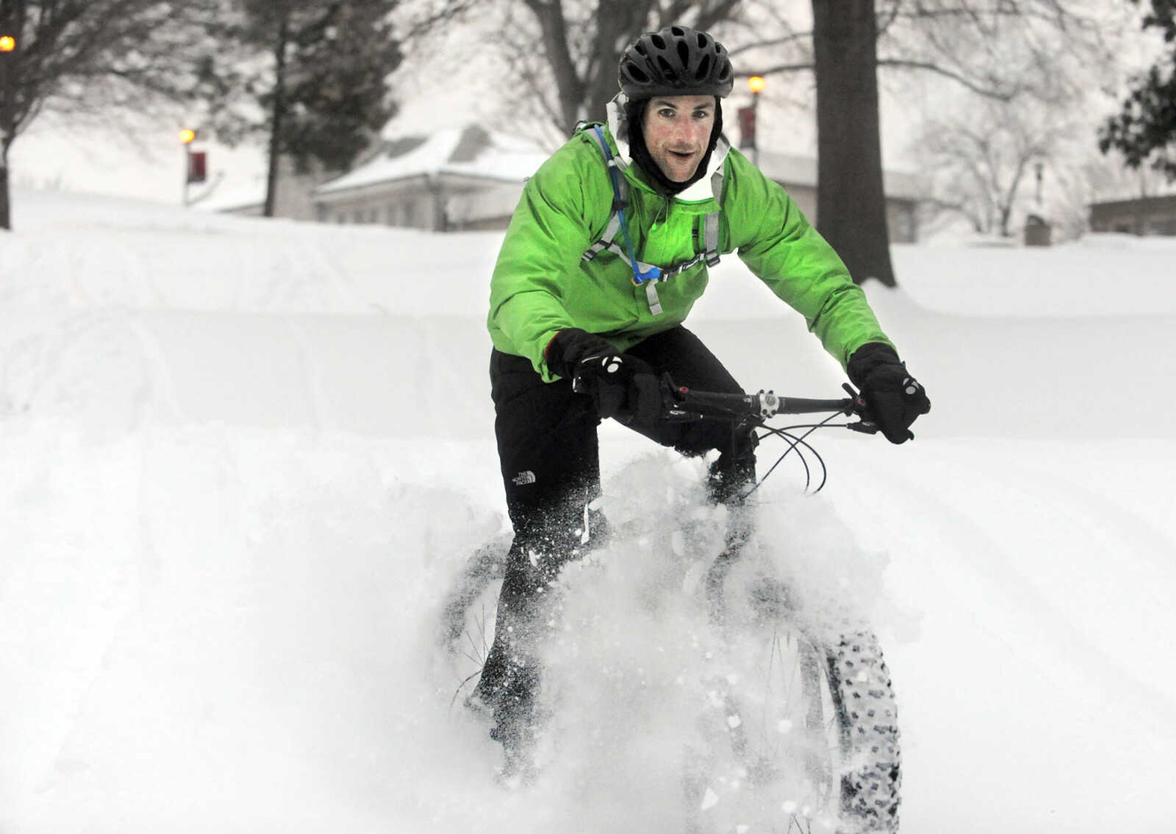 LAURA SIMON ~ lsimon@semissourian.com

Tim Vollink rides his fat bike through the snow on the terraces outside Academic Hall Tuesday evening, Feb. 17, 2015.