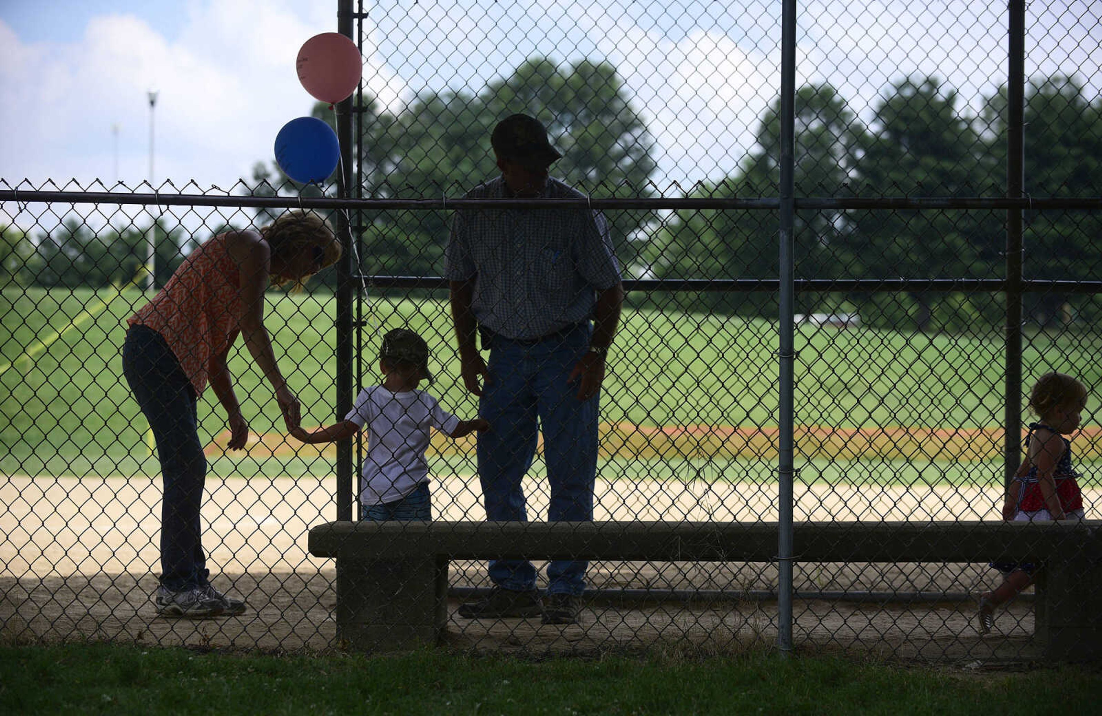 Judy and Rodney Smith celebrate the Fourth of July with their grandchildren Wyatt and Charlotte Stearns on Tuesday at Jackson City Park.