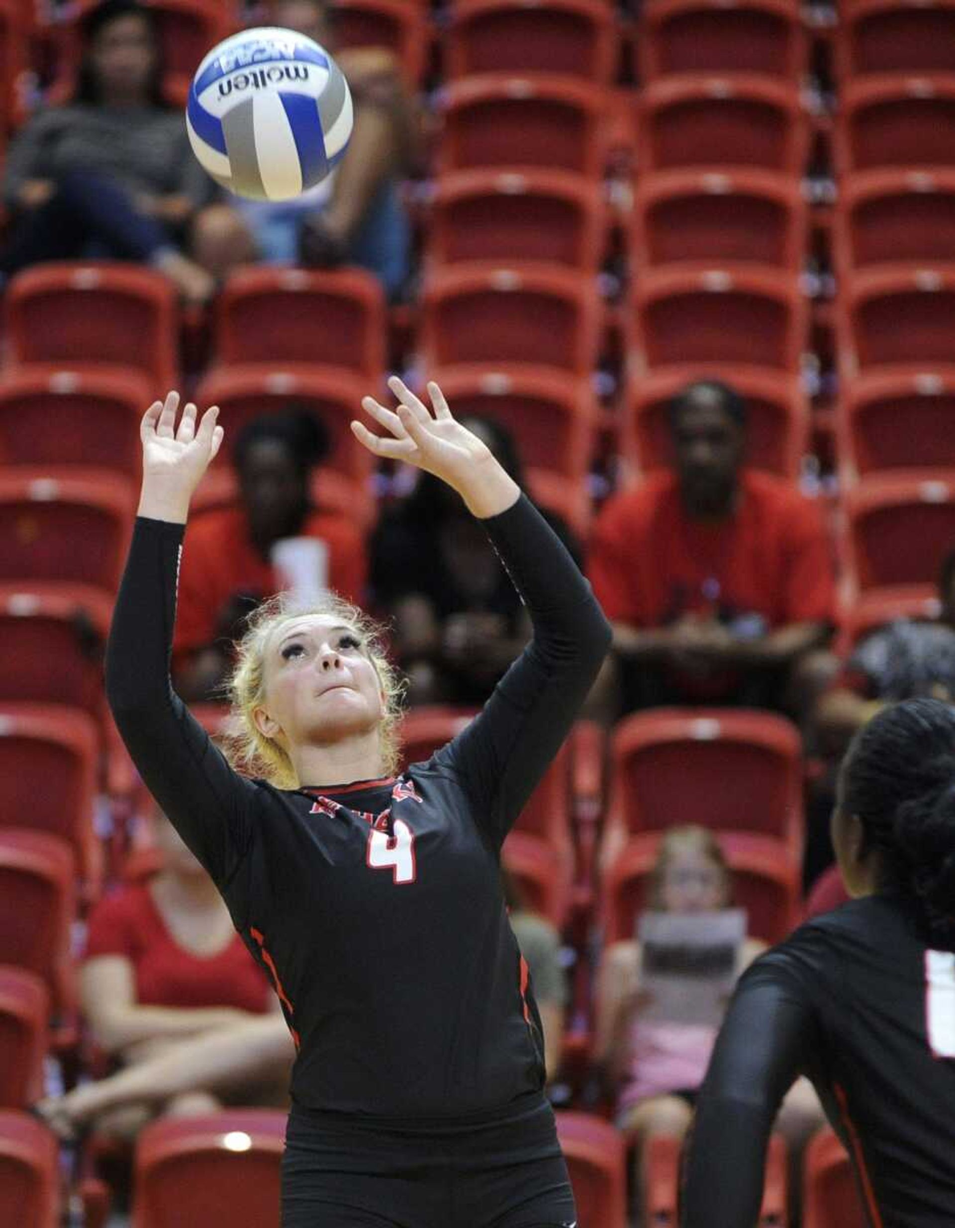 Southeast Missouri State's Rachel Poole sets the ball against Louisiana Tech during the first set Saturday, Aug. 27, 2016 at the Show Me Center.