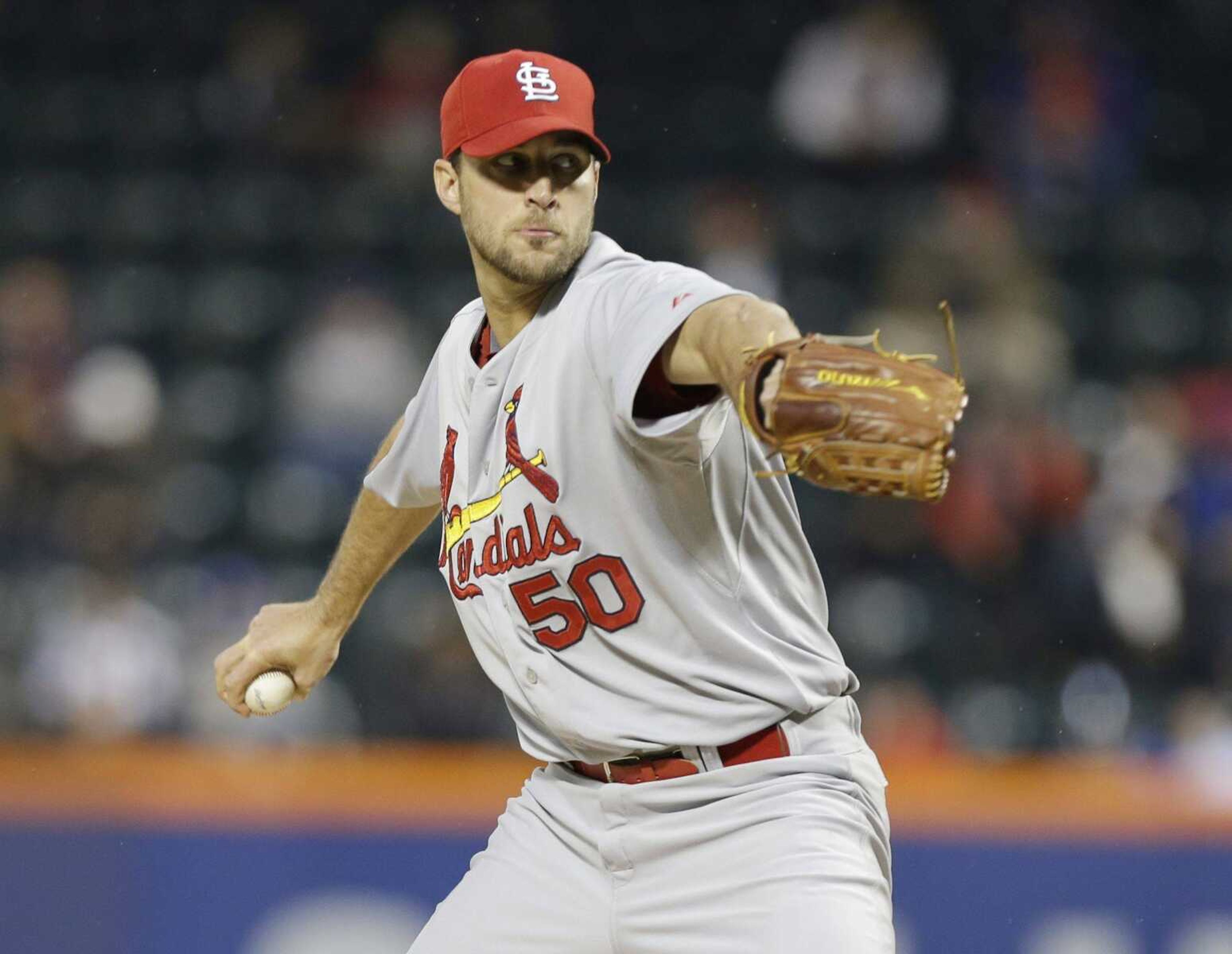 Cardinals starter Adam Wainwright delivers a pitch to a Mets batter during the first inning Tuesday in New York. (Frank Franklin II ~ Associated Press)