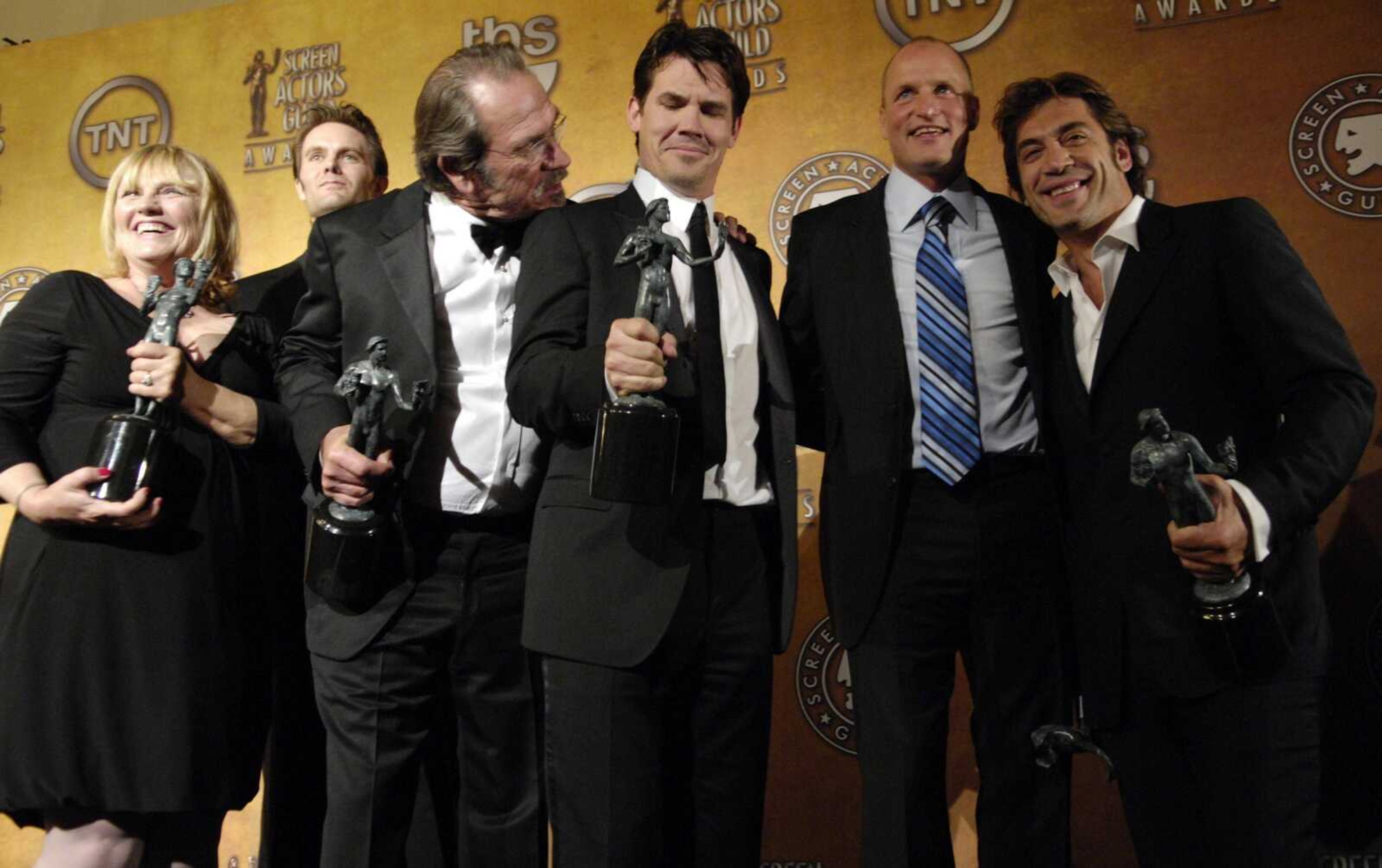 From left to right, Tess Harper, Garret Dillahunt, Tommy Lee Jones, Josh Brolin, Woody Harrelson and Javier Bardem held their awards for outstanding performance by a cast in a motion picture for their work in "No Country for Old Men" on Sunday at the 14th Annual Screen Actors Guild Awards in Los Angeles. (Chris Pizzello ~ Associated Press)