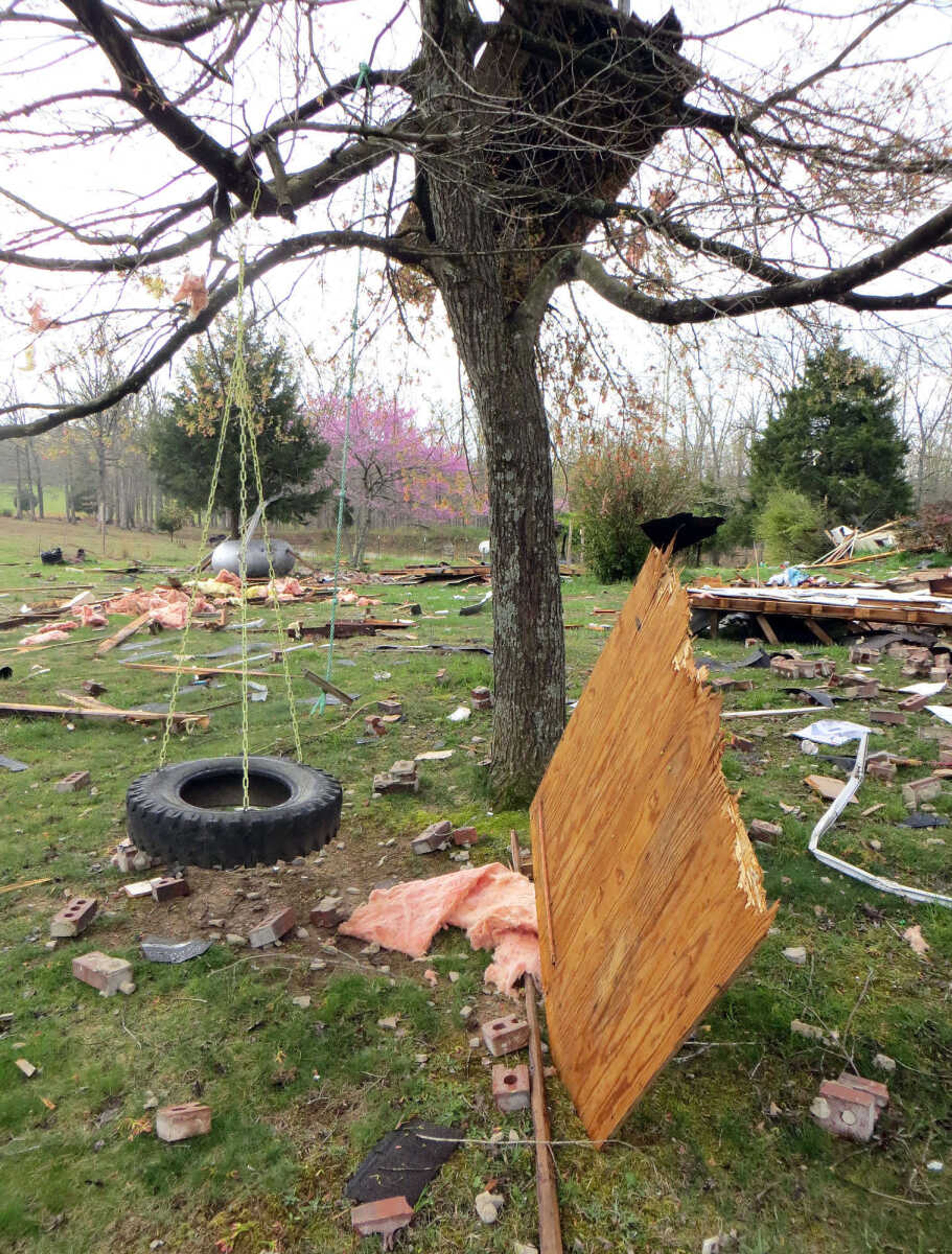 Debris from Isaac Wittenborn's house landed in a tree after it exploded Saturday night.