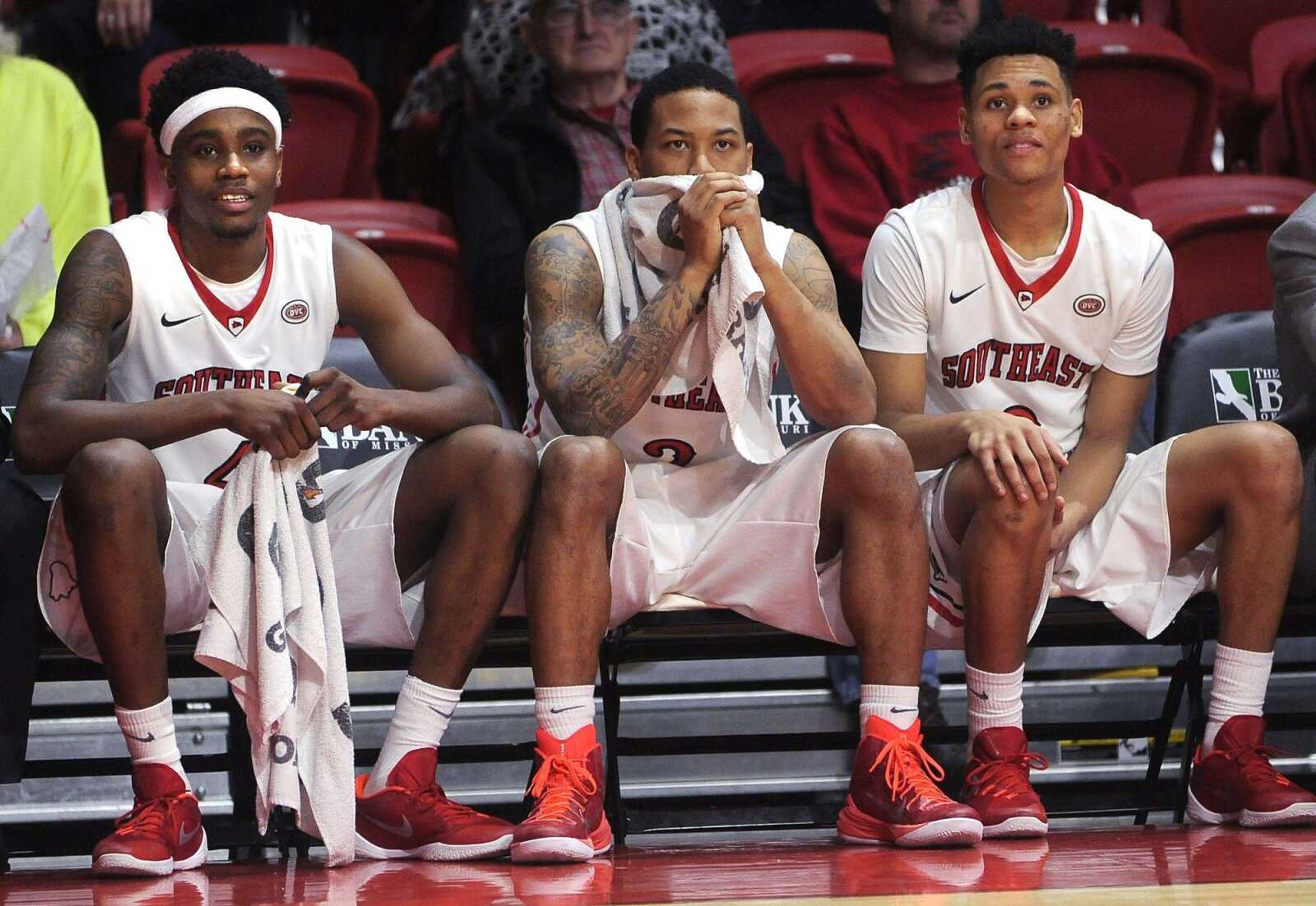 Southeast Missouri State's Antonius Cleveland, left, Isiah Jones and Eric McGill watch the final moments of Sunday's game against Harris-Stowe at the Show Me Center. (Fred Lynch)