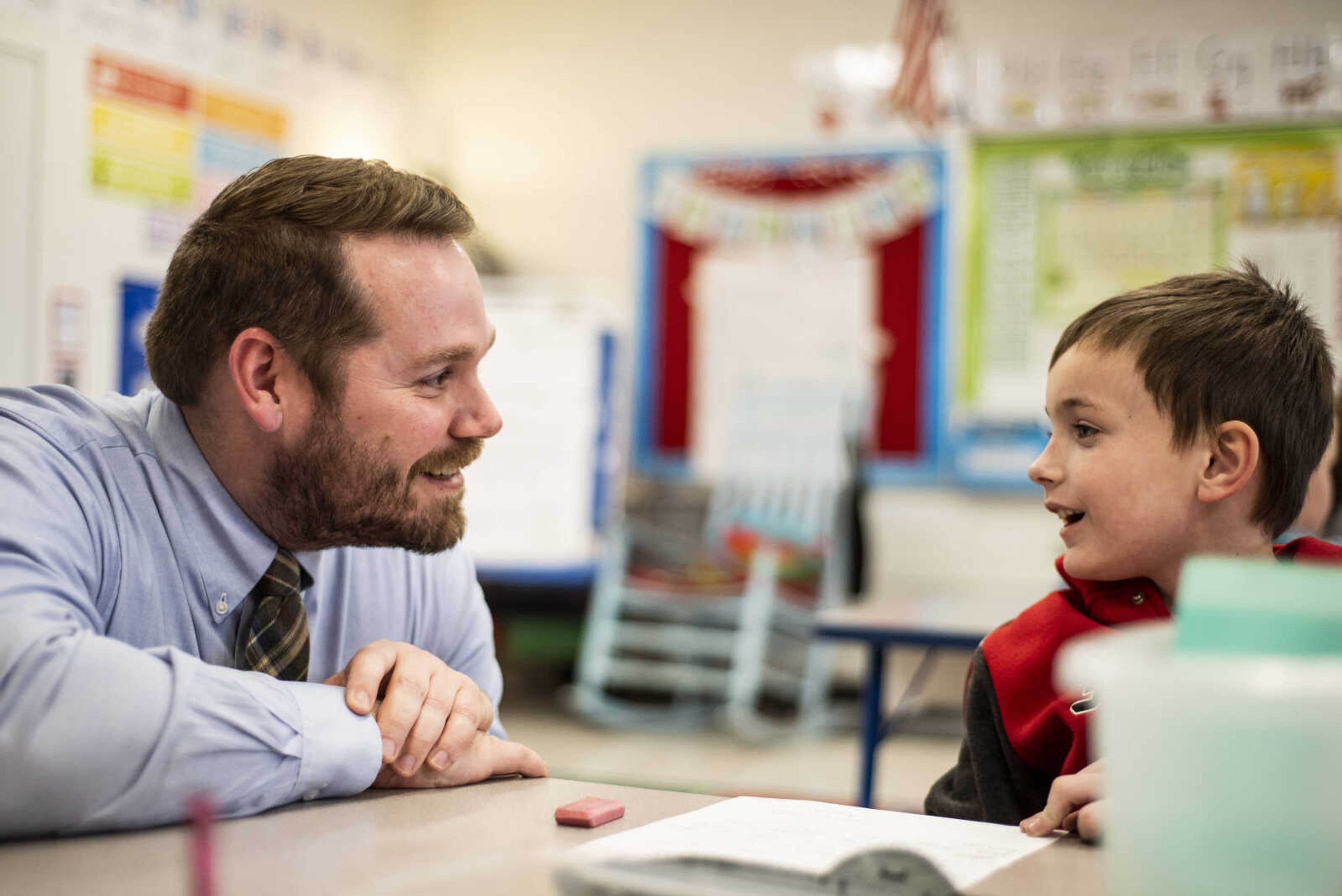 Principal Lance McClard talks with first-grader Jacob Tucker during a classroom visit Friday, March 15, 2019, at North Elementary School in Jackson.