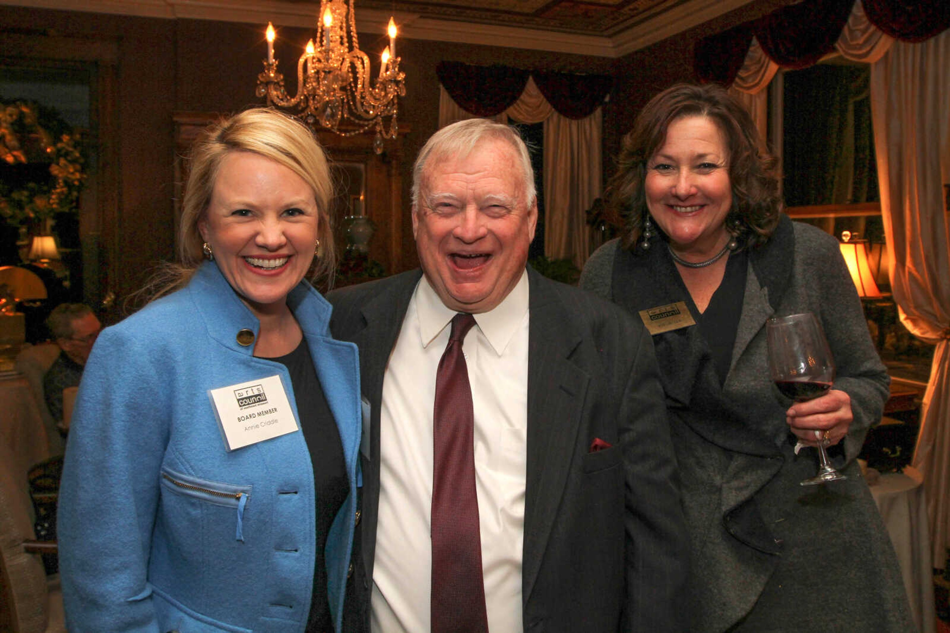 GLENN LANDBERG ~ glandberg@semissourian.com

Annie Criddle, left, Jerry Ford and Lori Ann Kinder pose for a photo during the second annual Dingeldein Gala at the Oliver-Leming House Friday, Jan. 16, 2014.