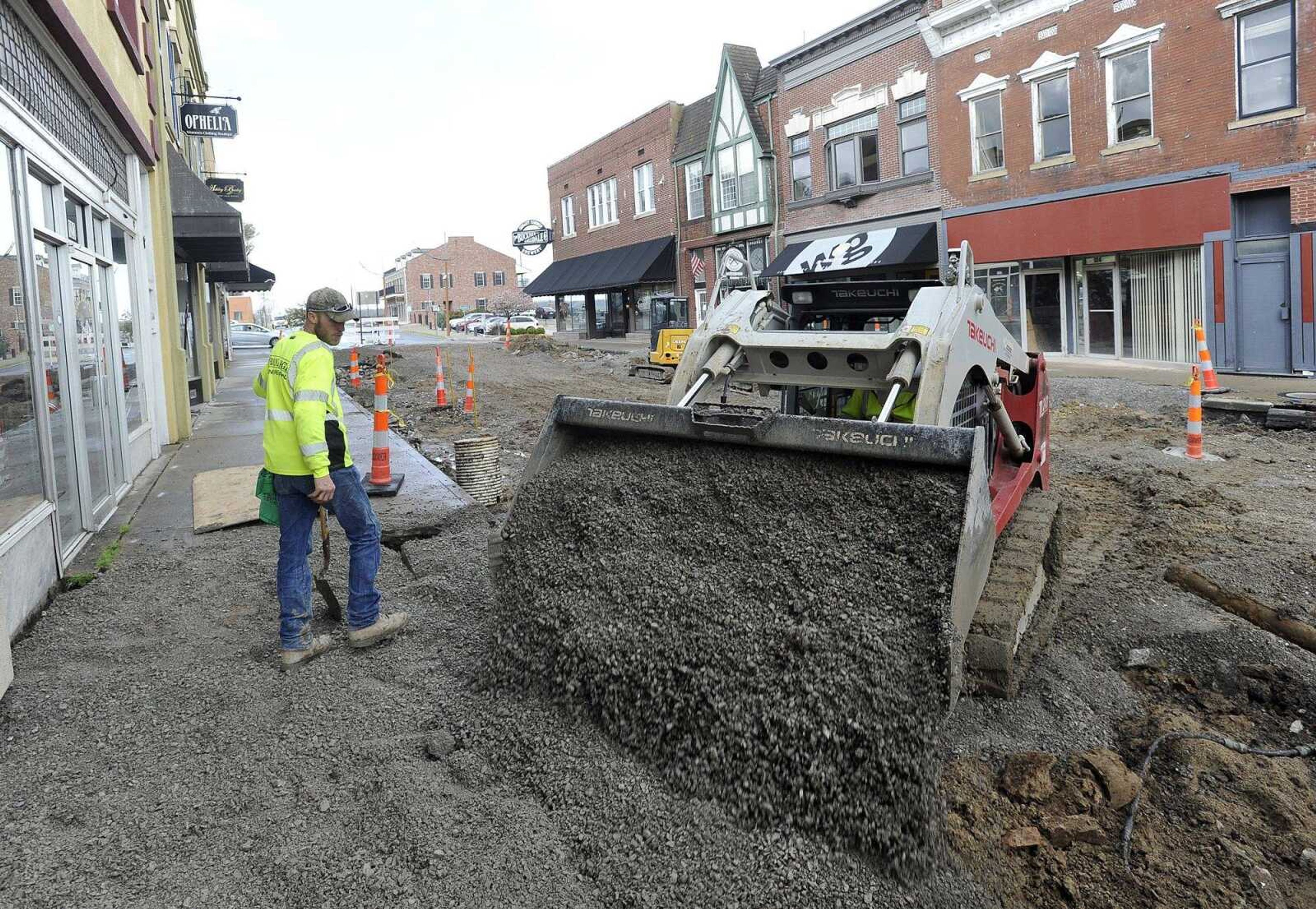 A Fronabarger Concreters crew works Thursday on the Main Street sidewalk-replacement project in downtown Cape Girardeau.