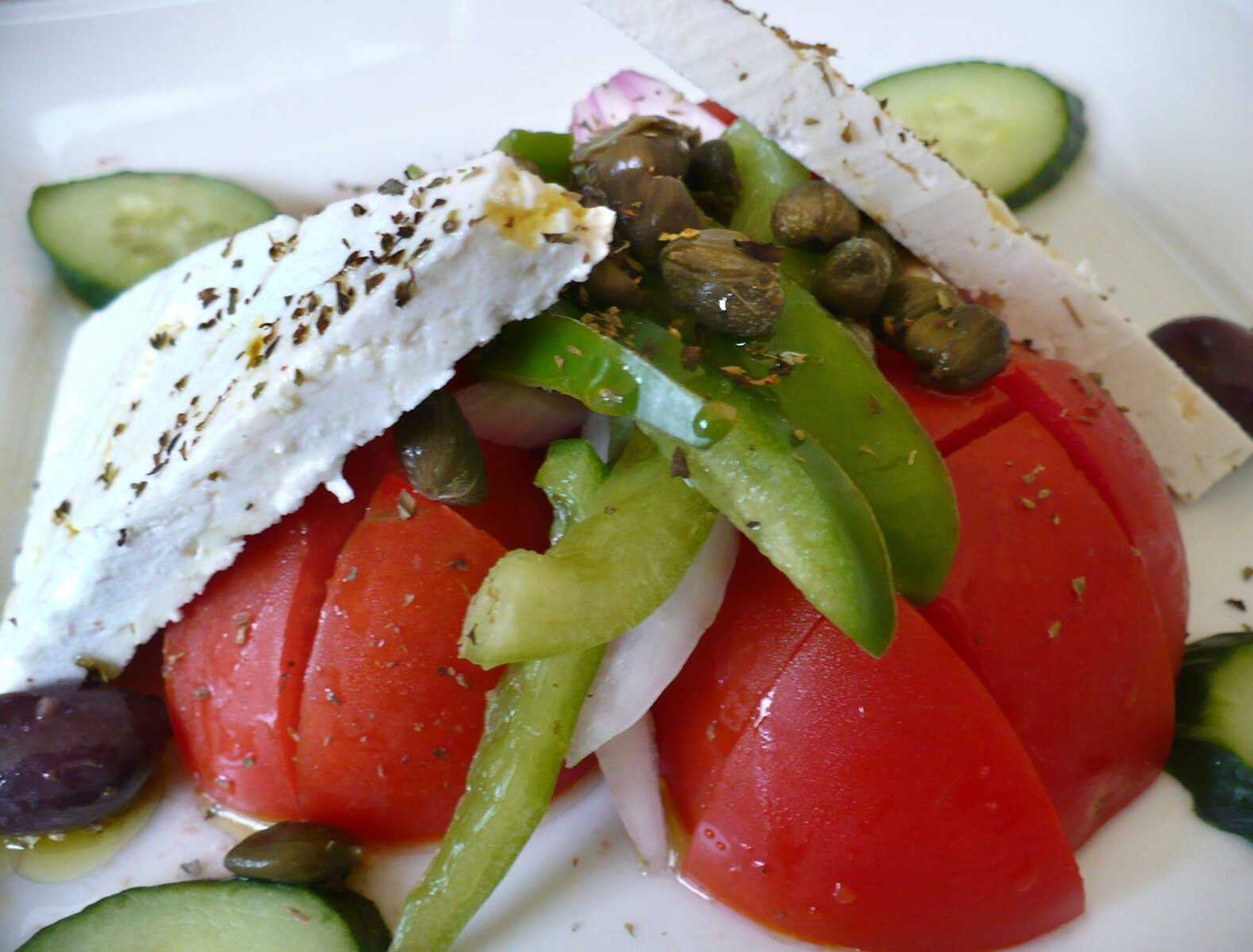 Feta cheese is an indispensable ingredient in Greek salads, like this one served at Daphne's Restaurant on the Plaka in Athens, Greece. (TOM HARTE)