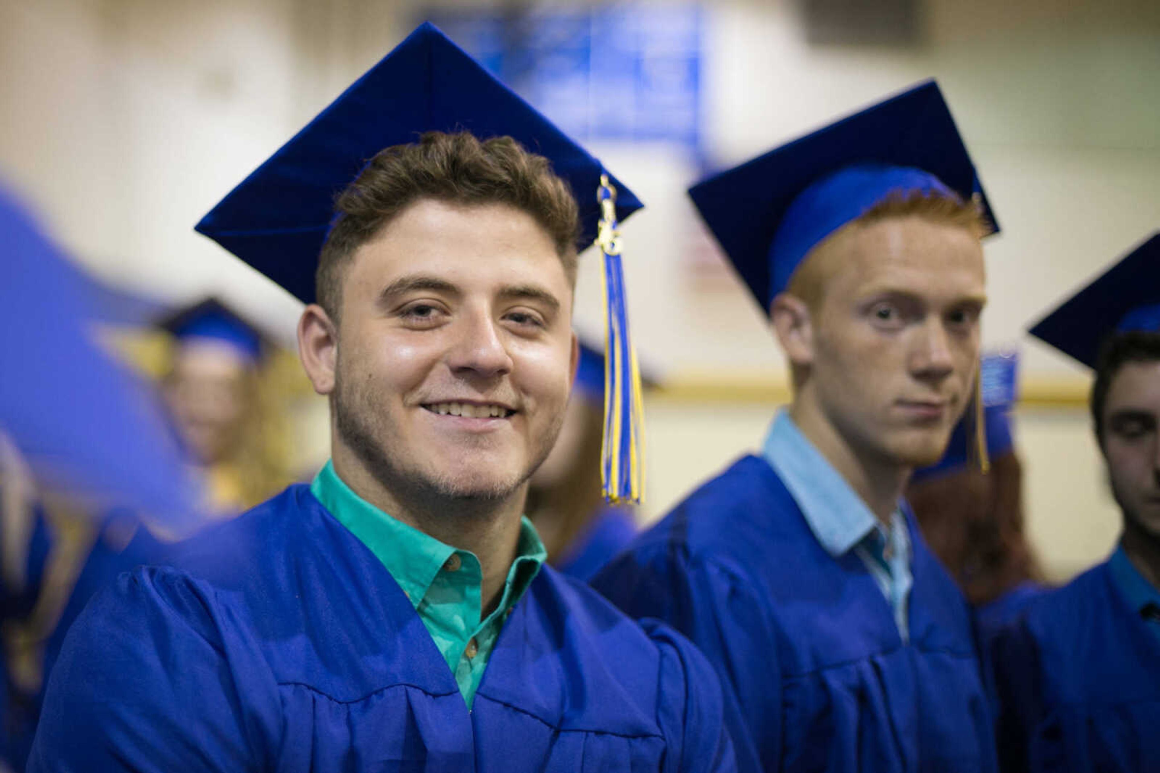 GLENN LANDBERG ~ glandberg@semissourian.com

Students prepare for graduation before the Scott City commencement Sunday, May 17, 2015 at Scott City High School.