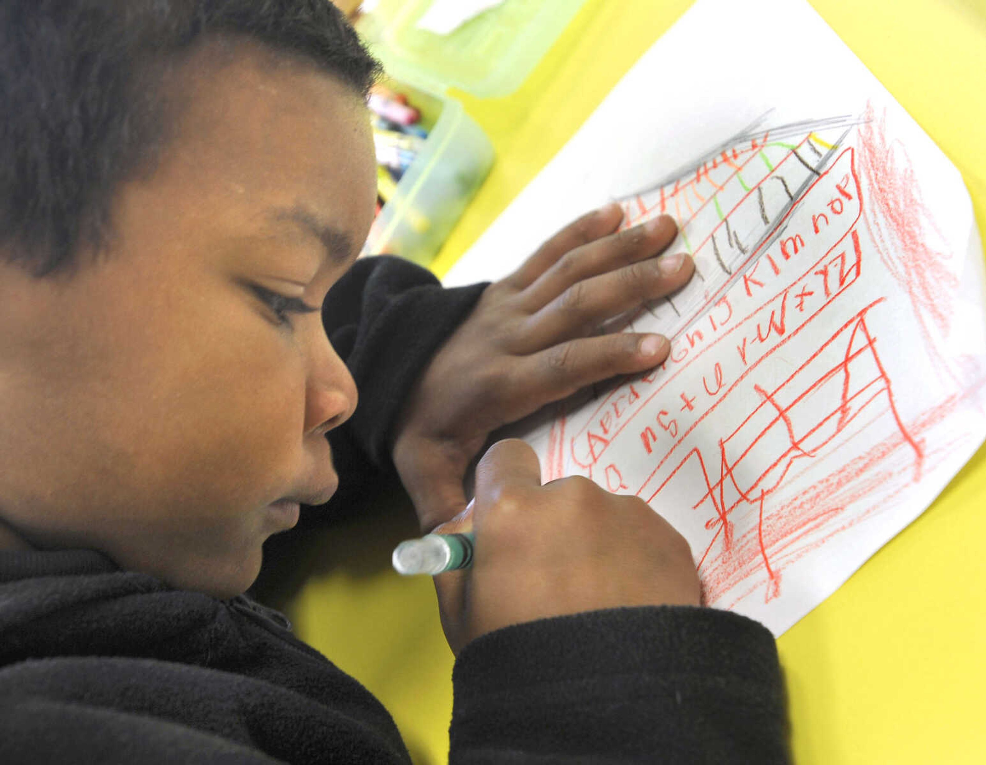 FRED LYNCH ~ flynch@semissourian.com
Kindergartener B.J. Webb draws a picture of his classroom Monday, Jan. 30, 2012 showing what he missed the most while attending temporary classes at Lynwood Baptist Church after the Dec. 6 fire at the school.