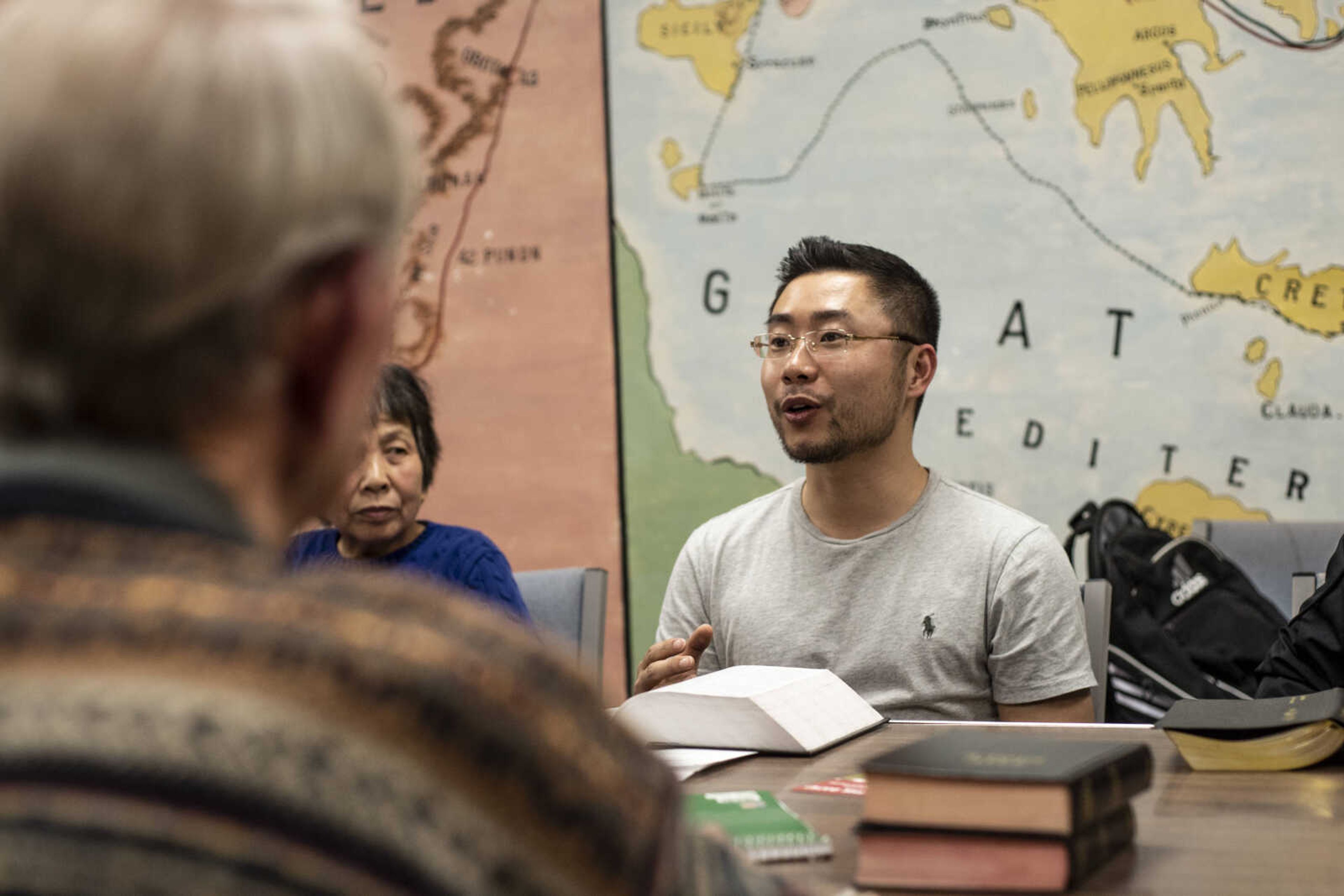 Pu (Paul) Xiao shares his thoughts with the rest of the group during the weekly Bible study Friday, March 8, 2019, at the Southeast Missouri State University Baptist Student Center in Cape Girardeau.