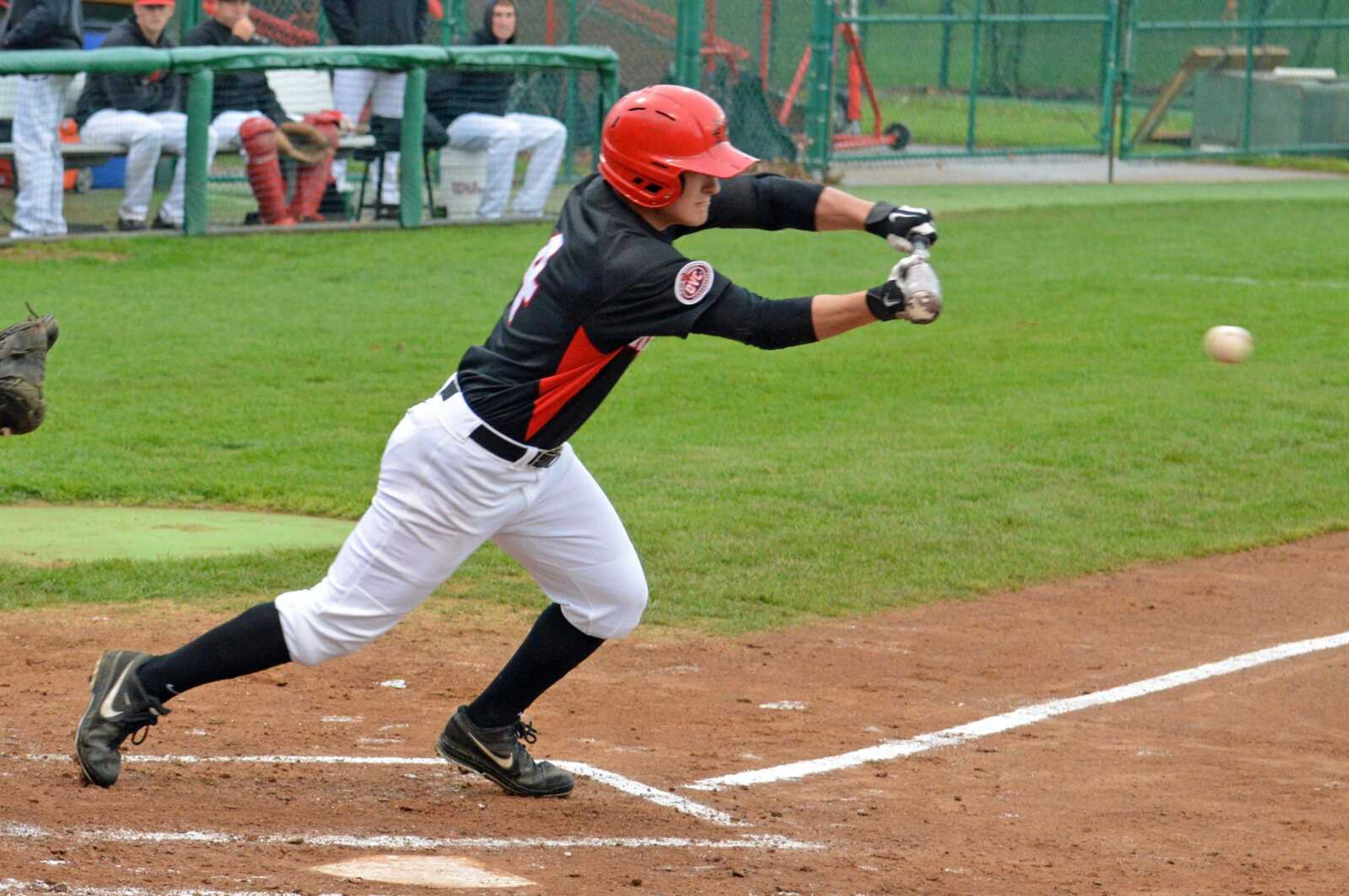 Southeast Missouri State&#8217;s Clayton Evans advances the runner and takes first with a bunt single during the second inning against Jacksonville State on Friday at Capaha Field. The Gamecocks won 9-8. (Wayne McPherson ~ Special to the Southeast Missourian)