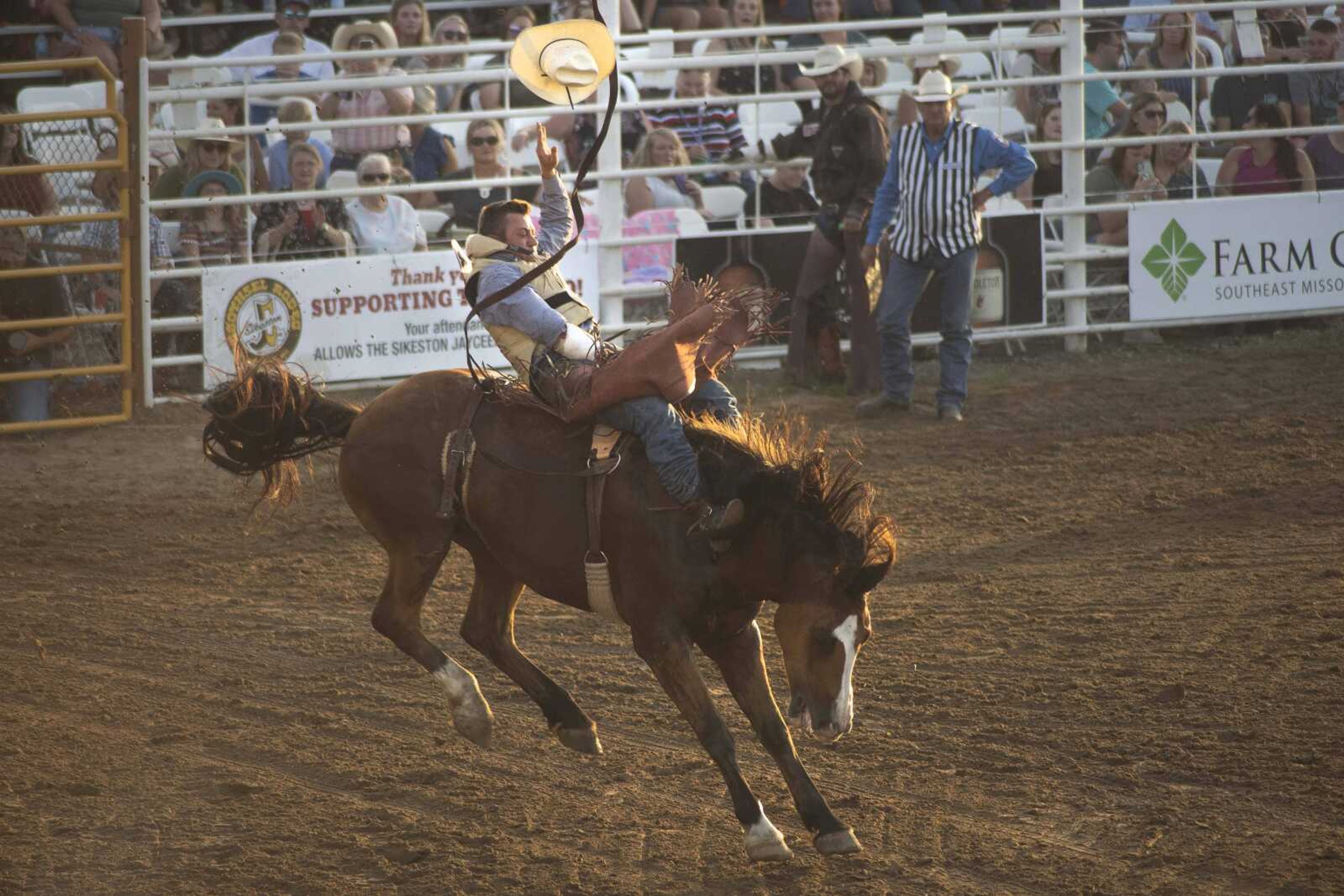 A rider performs during the first night of the Sikeston Jaycee Bootheel Rodeo on Wednesday, Aug. 11, 2021, in Sikeston, Missouri.