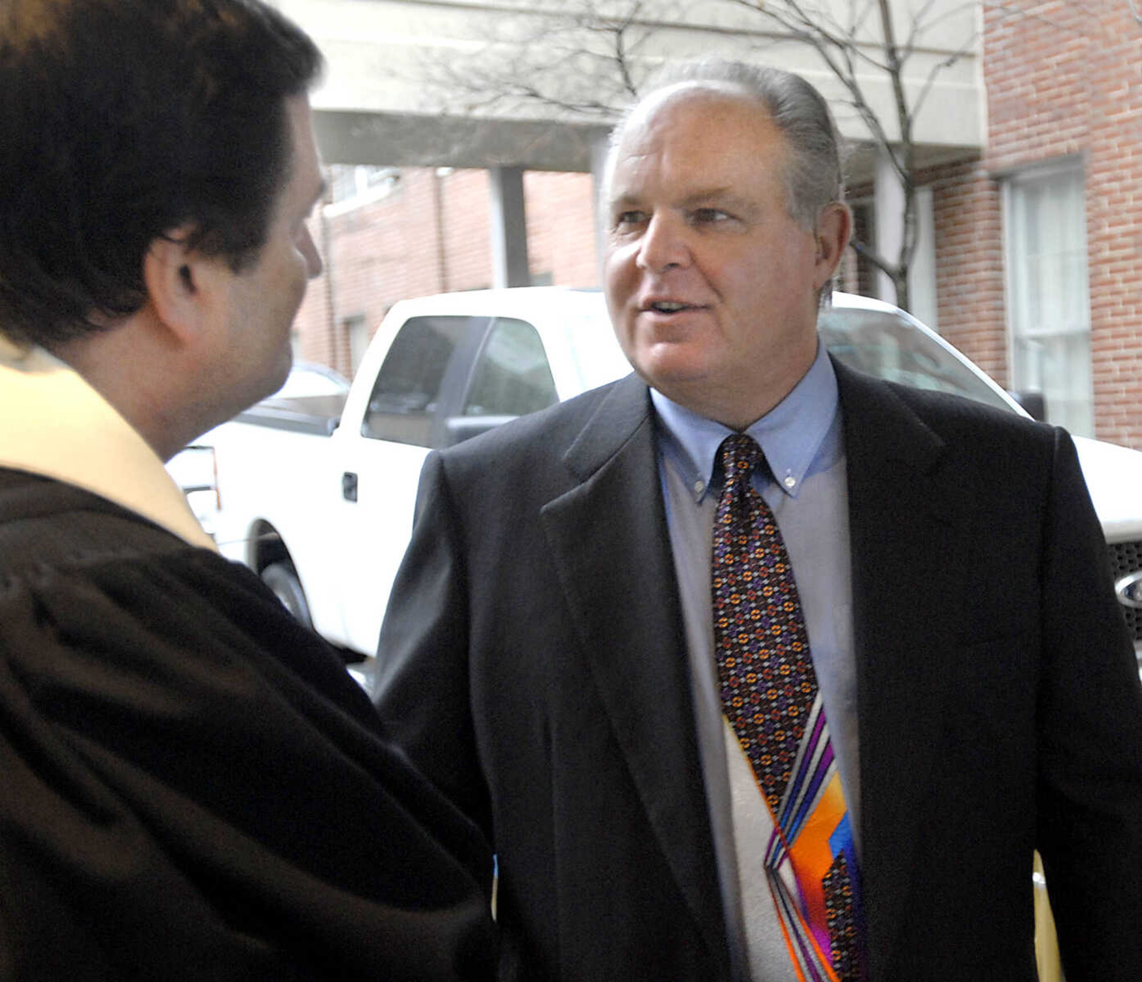 Rush Limbaugh greets Rev. Jeff Long outside Centenary United Methodist Church in Cape Girardeau. The radio pioneer flew in from Florida to be a pallbearer in the funeral of Mary Frances Kinder, Jan. 8, 2008.