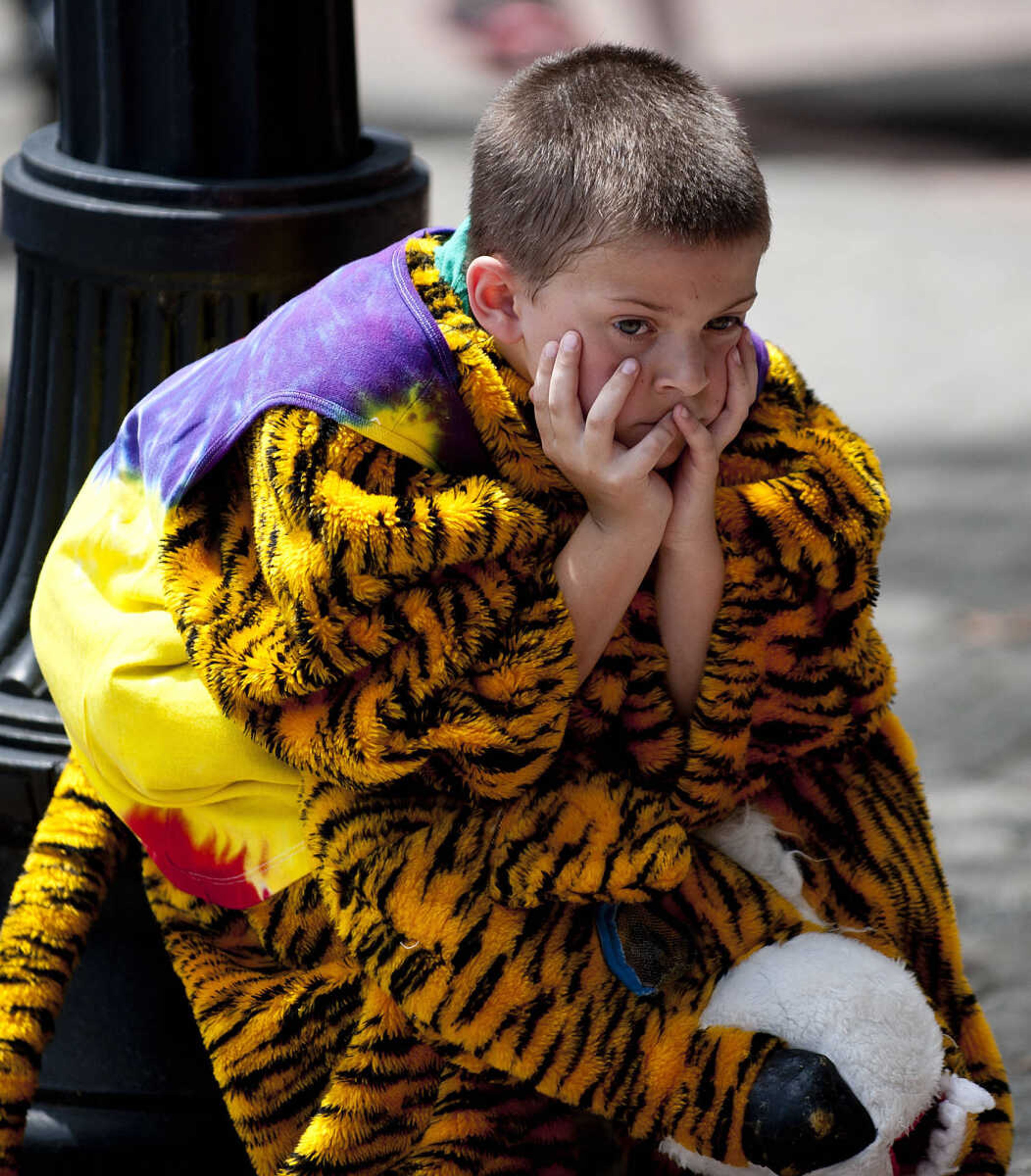 Rilaynd Grahan, 8, waits for the start of the Perryville Mayfest Bed Races Saturday, May 10, in Perryville, Mo. They and their team dressed as "Treasure Trolls," for the event.